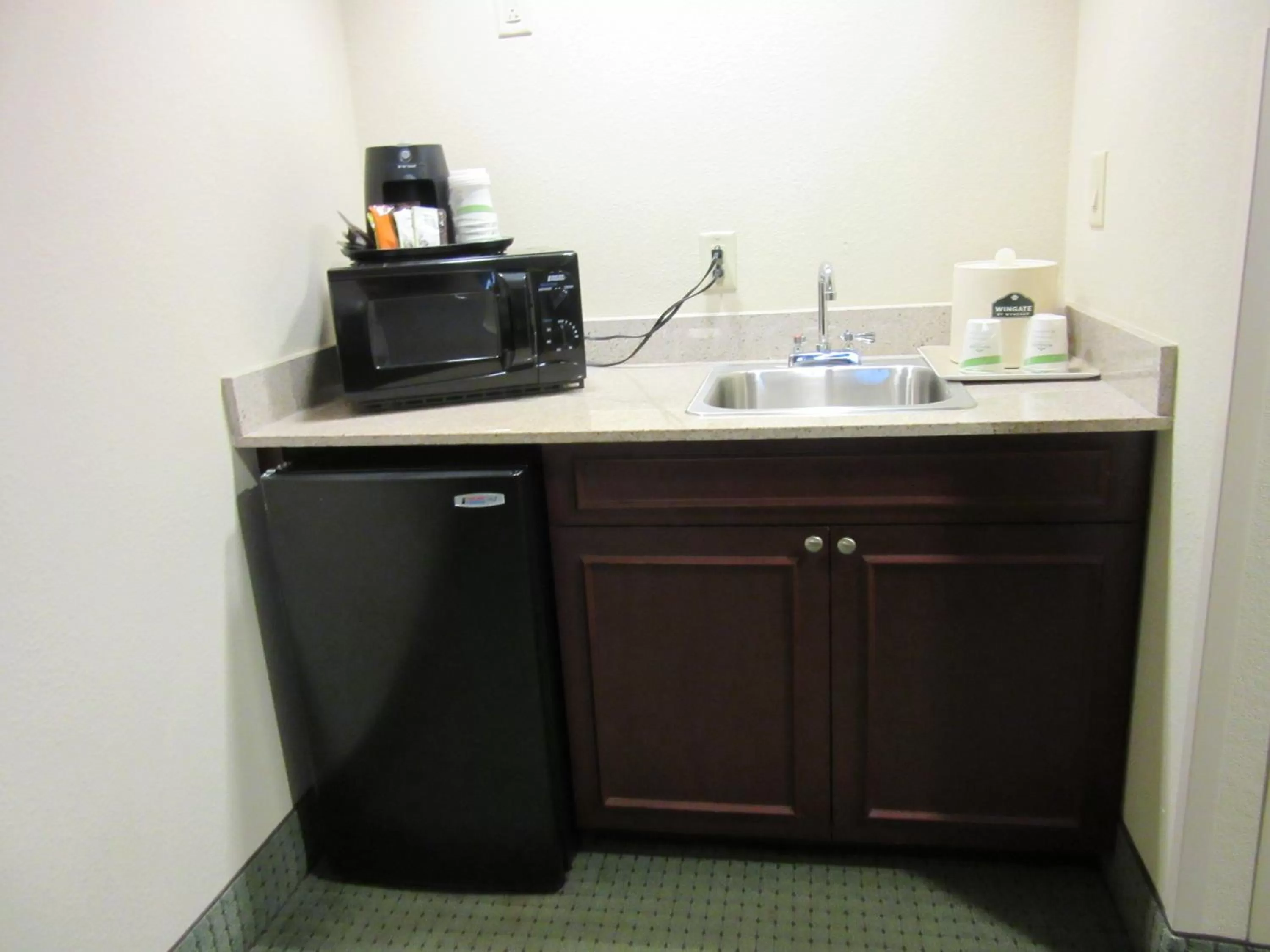 Kitchen or kitchenette in Wingate by Wyndham Charleston Southern University
