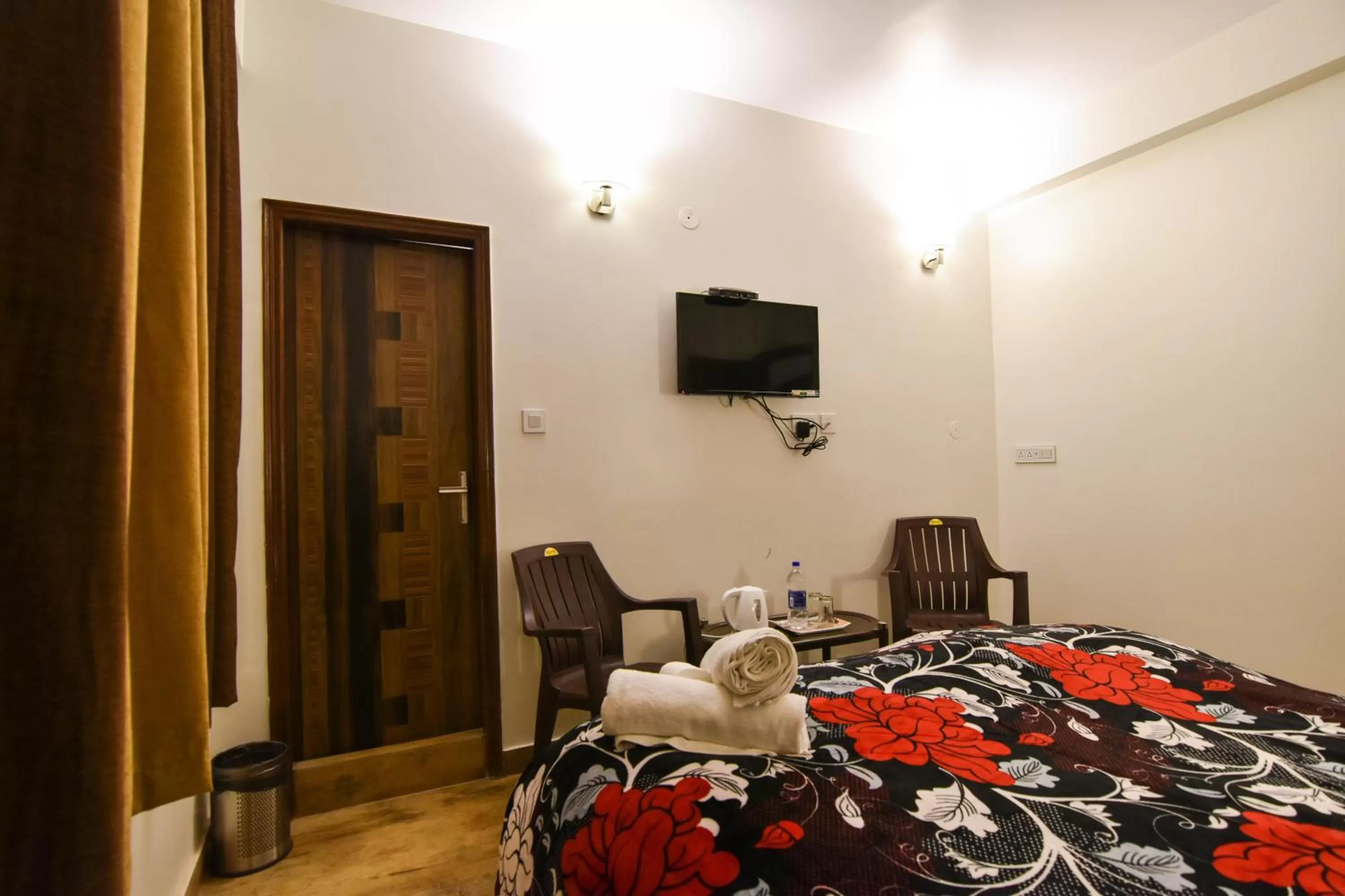 Bedroom, TV/Entertainment Center in Dhanlaxmi Apartments