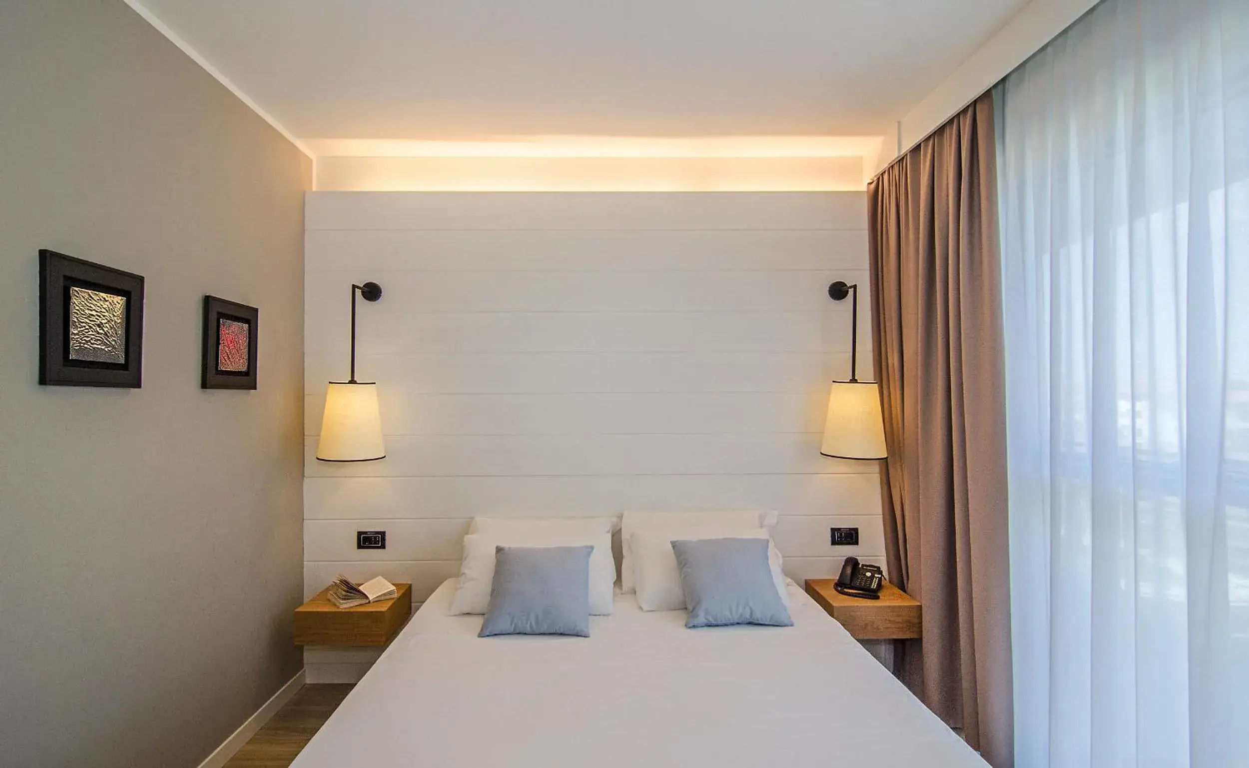 Bed in Hotel Viareggio
