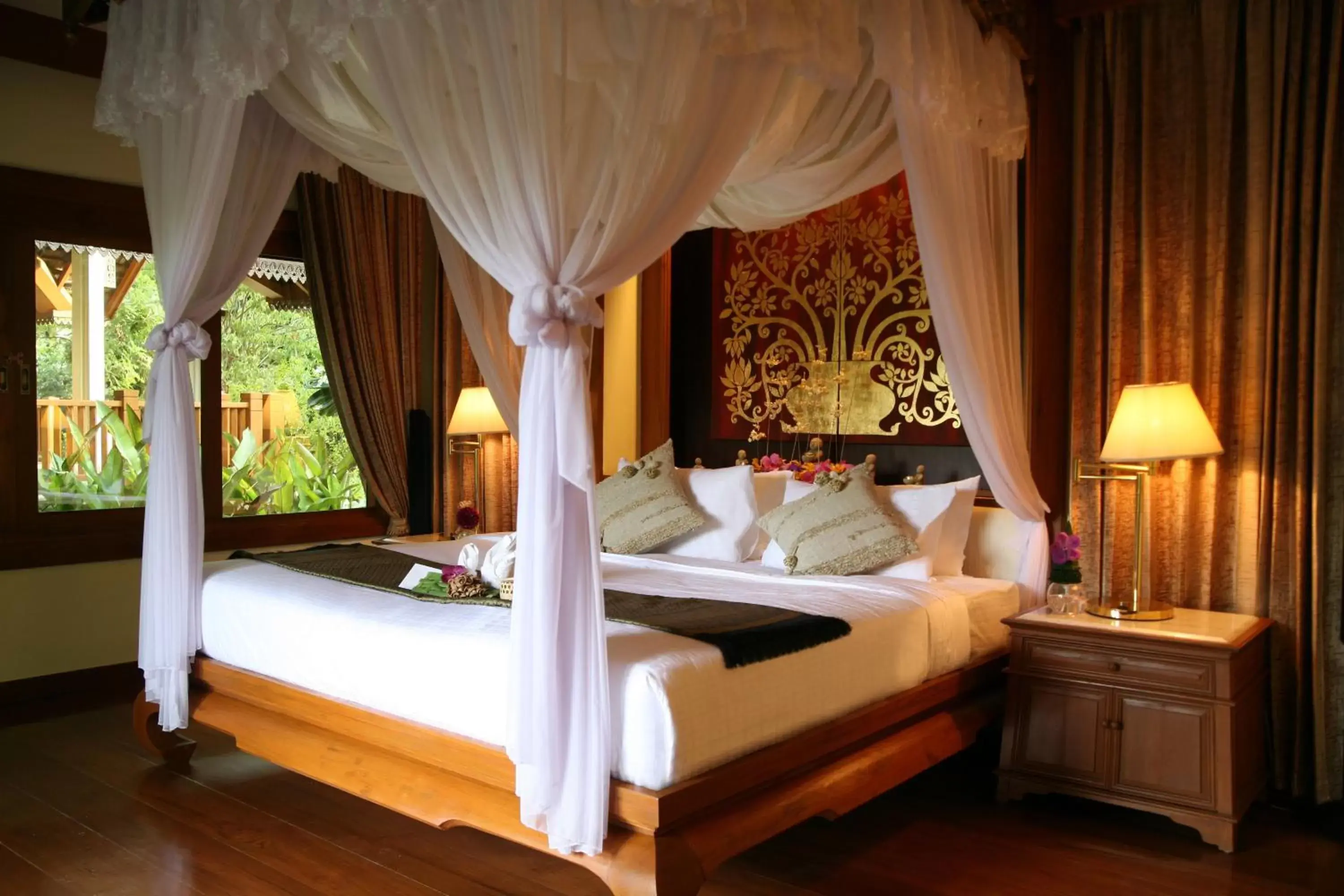 Photo of the whole room, Bed in Centara Khum Phaya Resort & Spa, Centara Boutique Collection