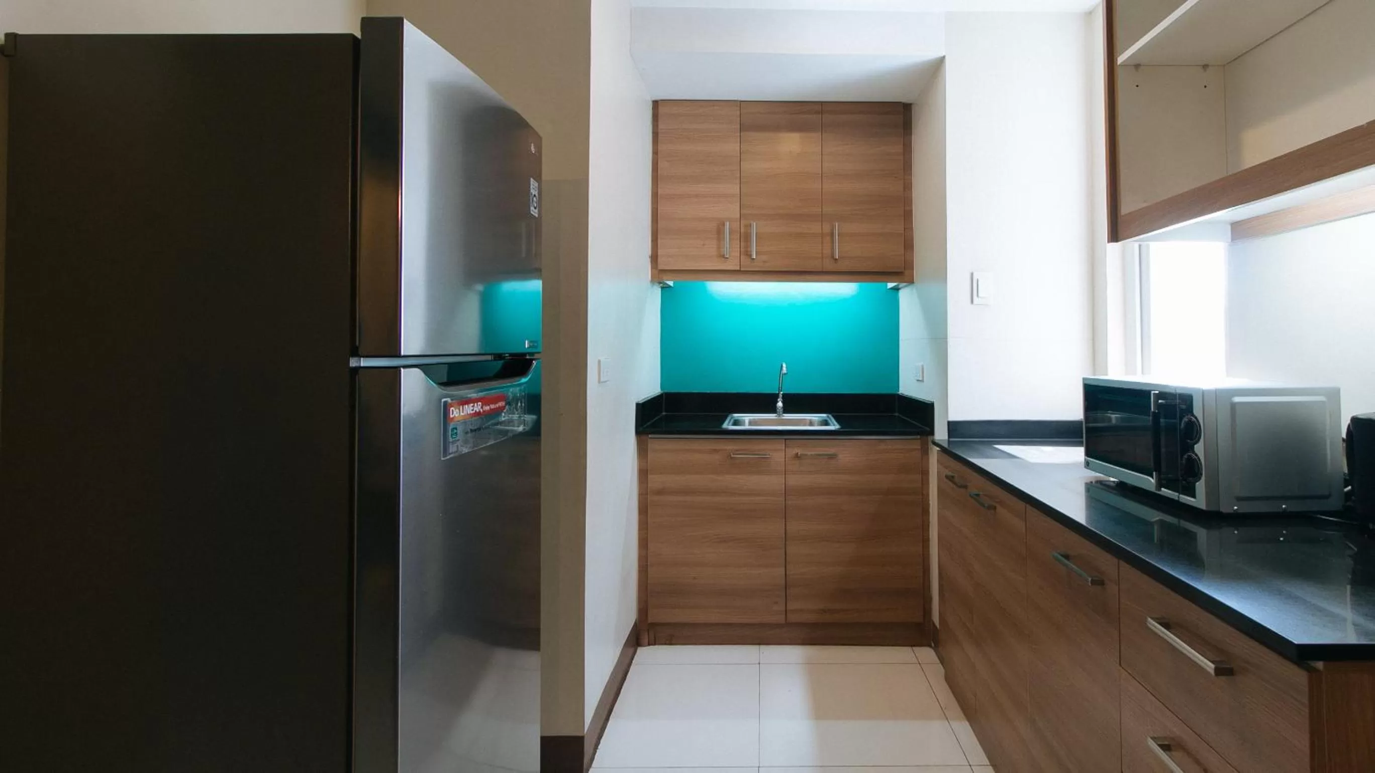 Kitchen or kitchenette in RedDoorz Plus at Kamuning Quezon City