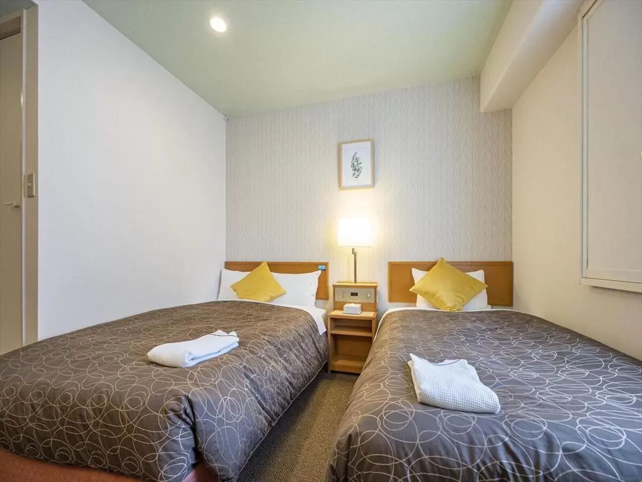 Photo of the whole room, Bed in Nishitetsu Inn Tenjin