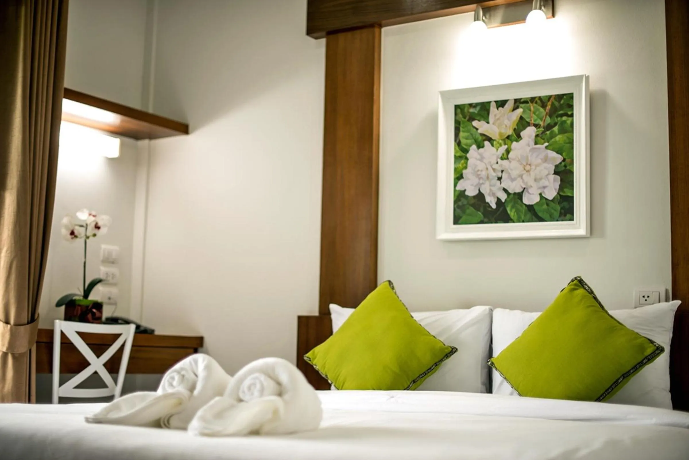 Bed in Cozytel Chiangmai