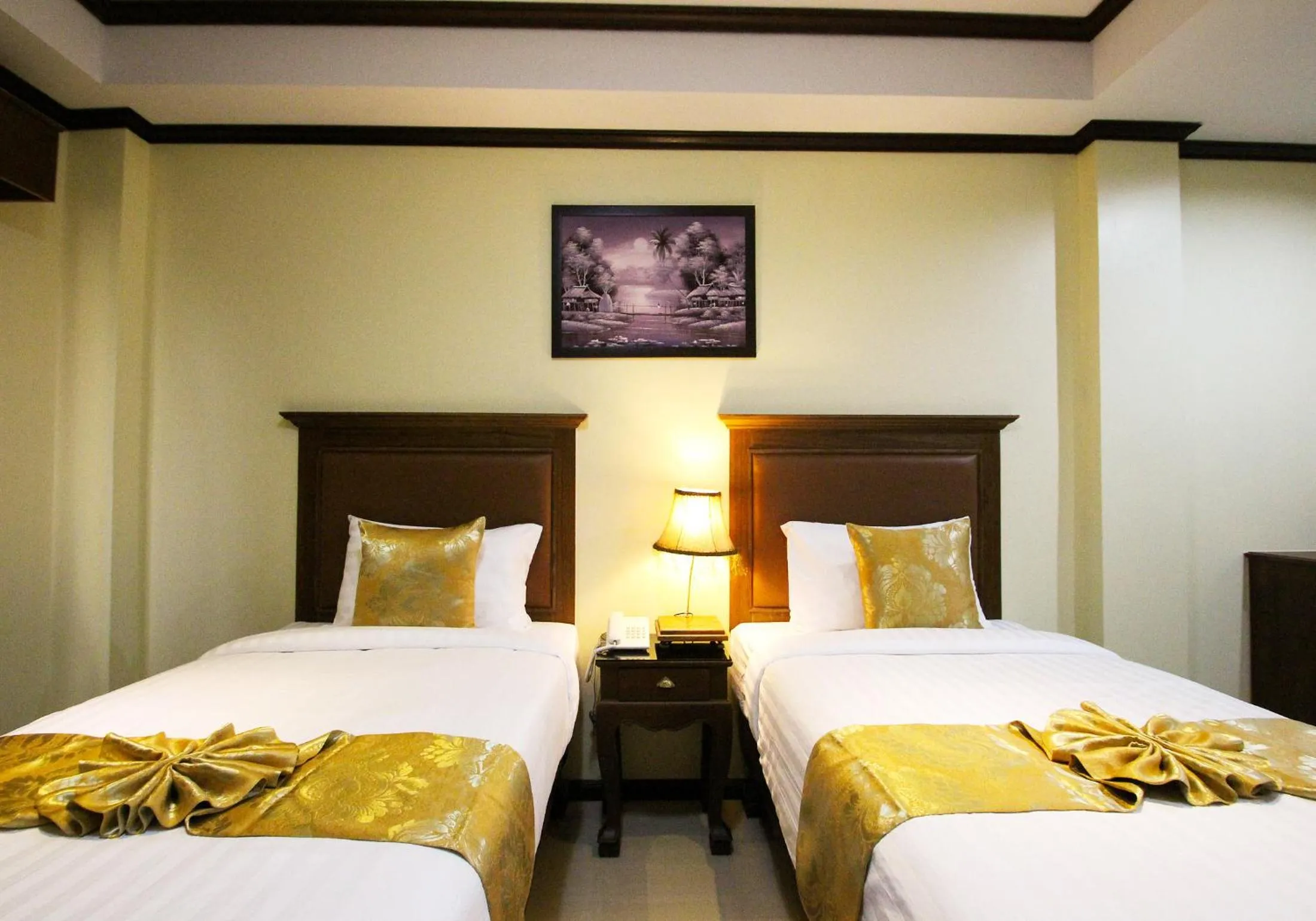 Bed in i Boutique Hotel