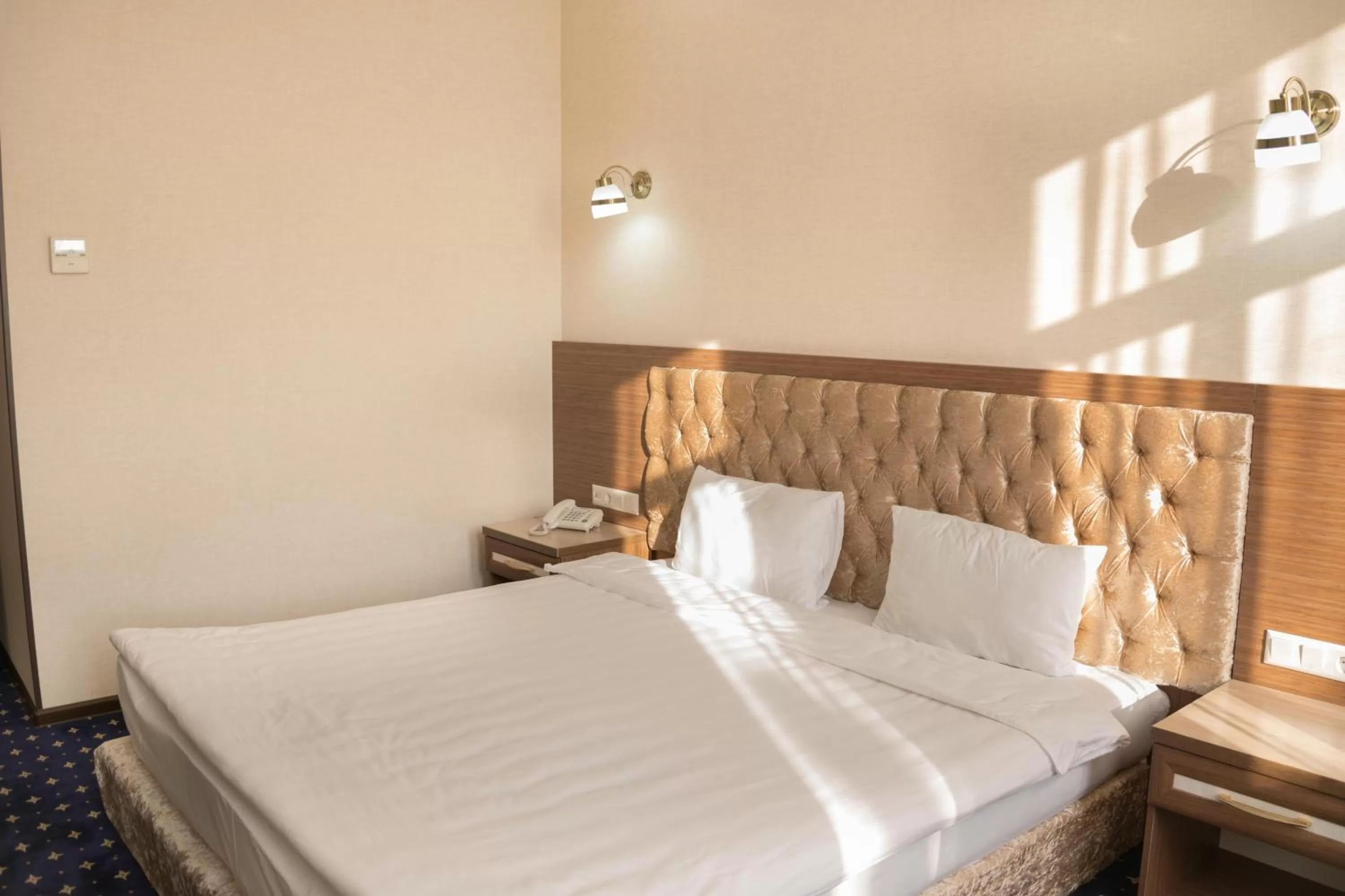 Bed in Hotel Khanaka