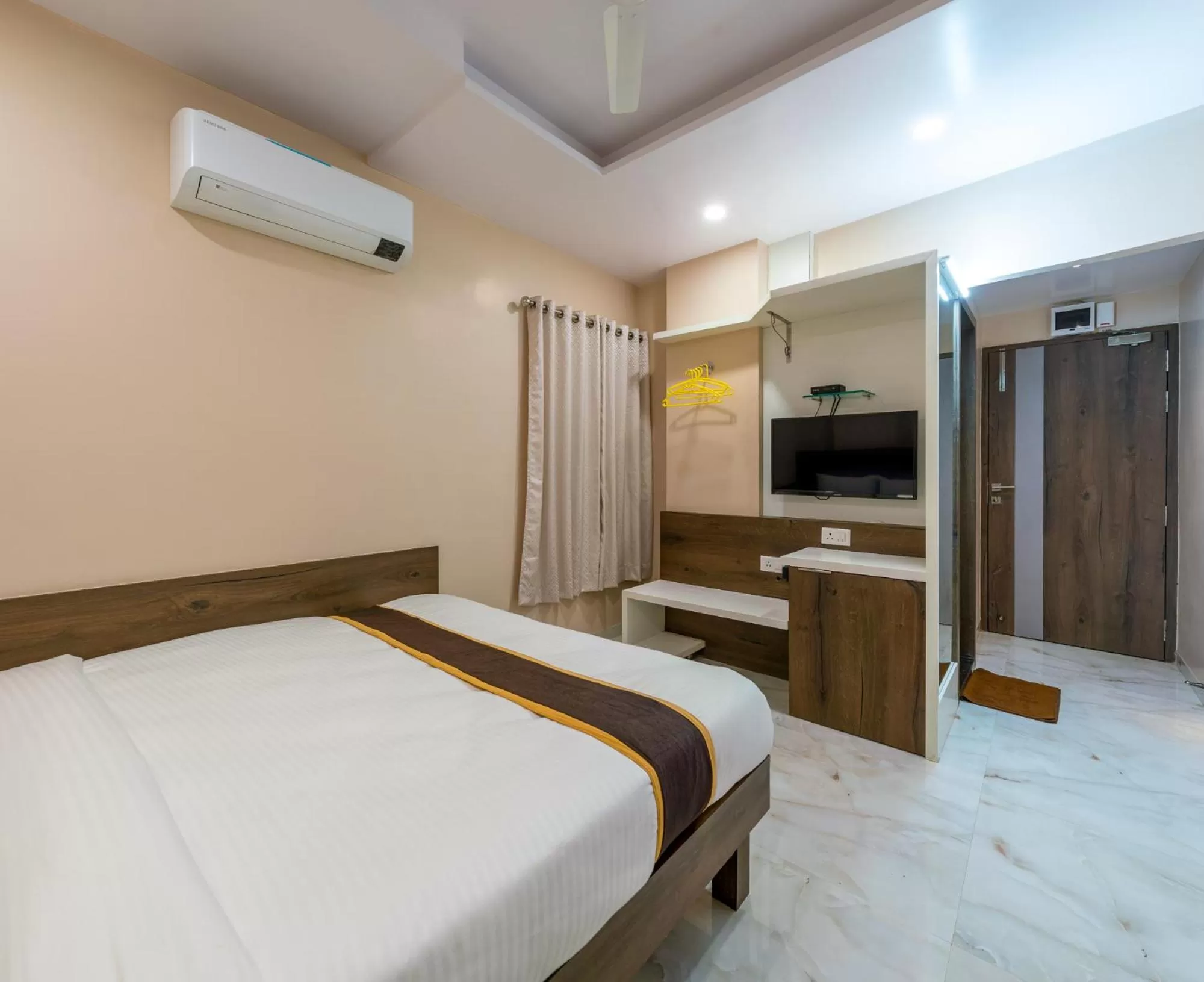 View (from property/room), Bed in Hotel Aatithya Satkar Near Mahalaxmi Temple