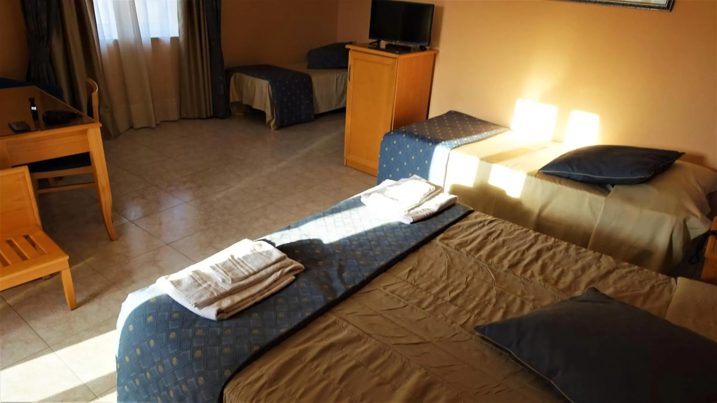 Classic Quadruple Room in Hotel Bristol Classic Quadruple Room in Hotel Bristol