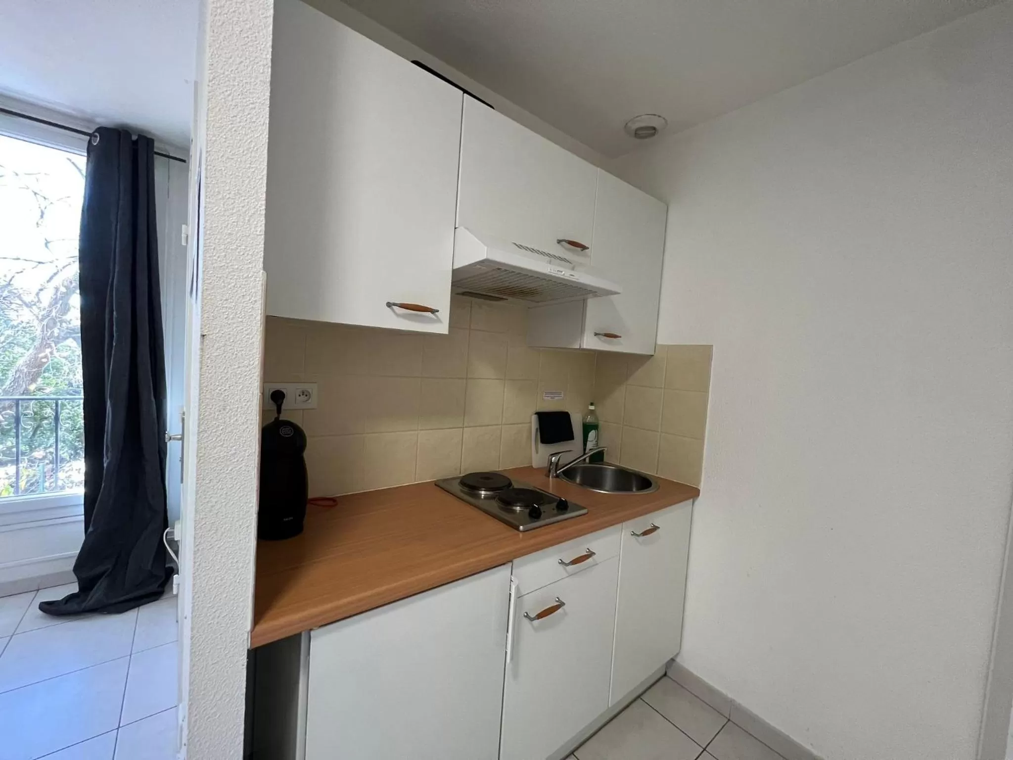 Kitchen or kitchenette in Kimi Résidence