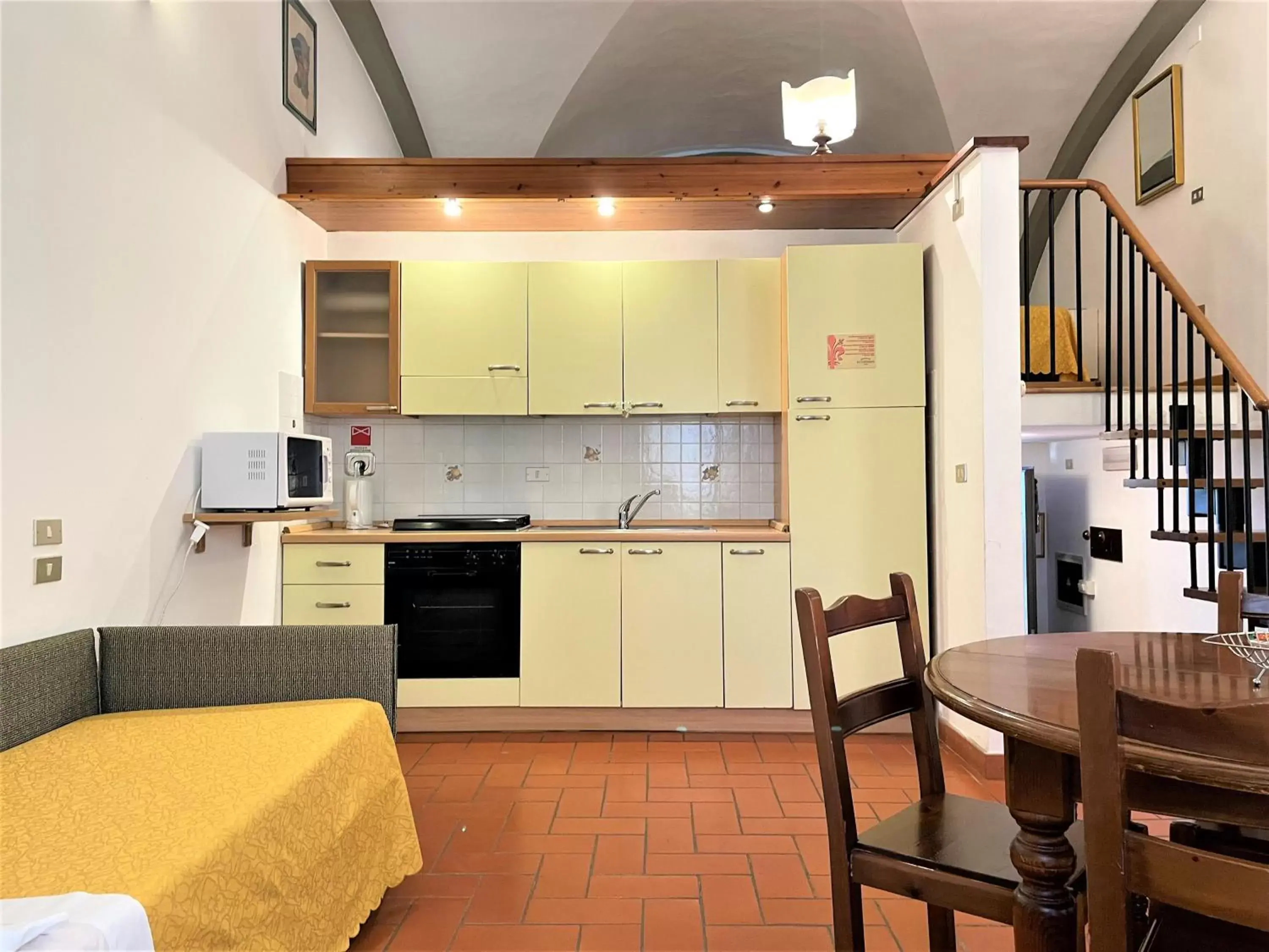 Living room, Kitchen/Kitchenette in Hotel Residence La Contessina