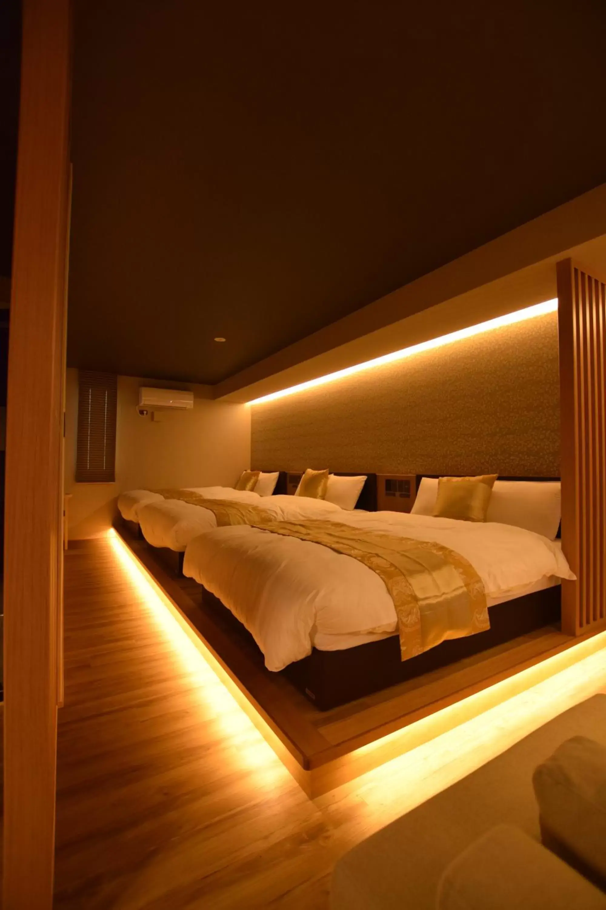 Bed in GRAND BASE Beppu Ekimae