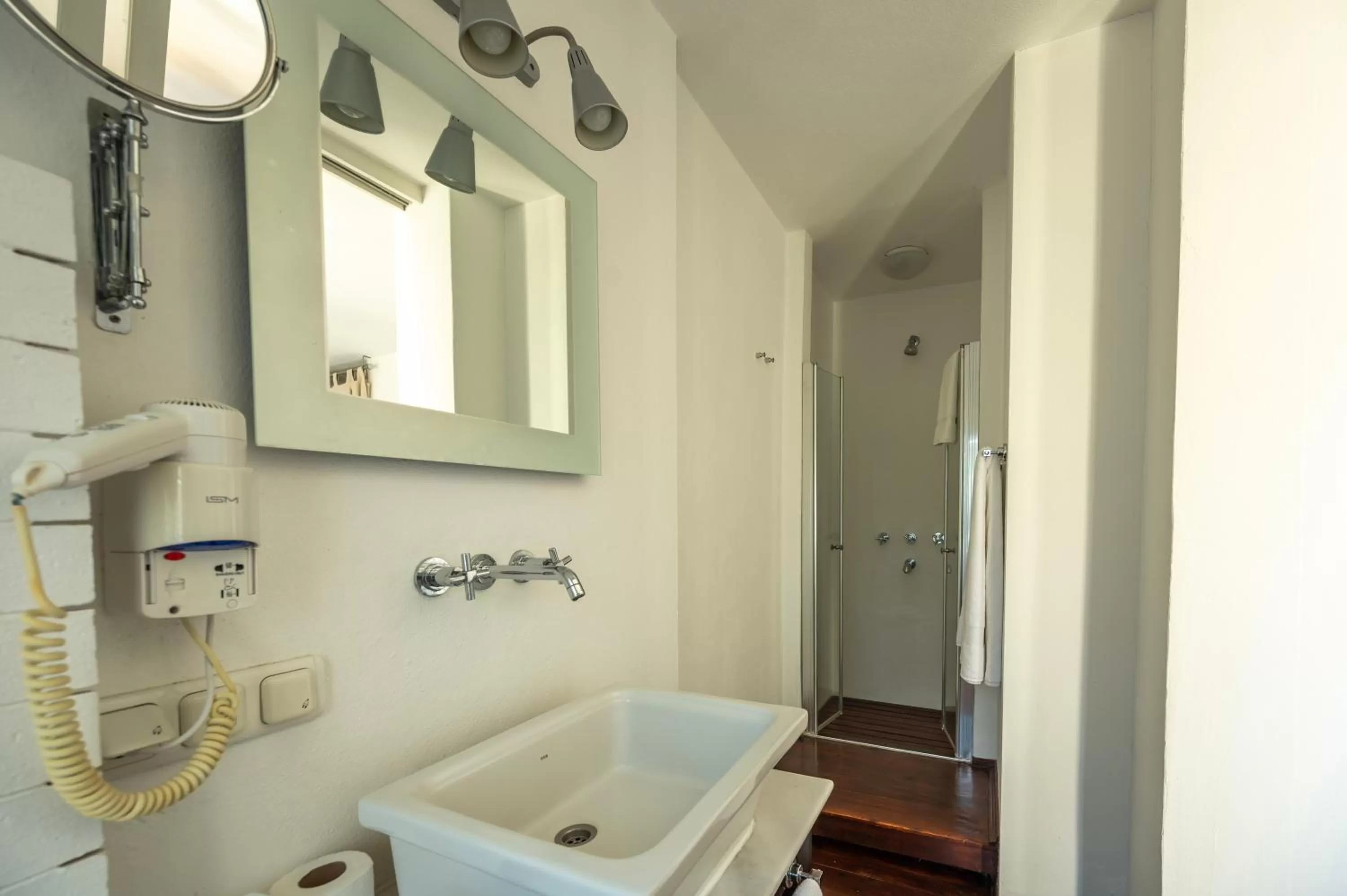 Bathroom in 4reasons hotel + bistro | 12+