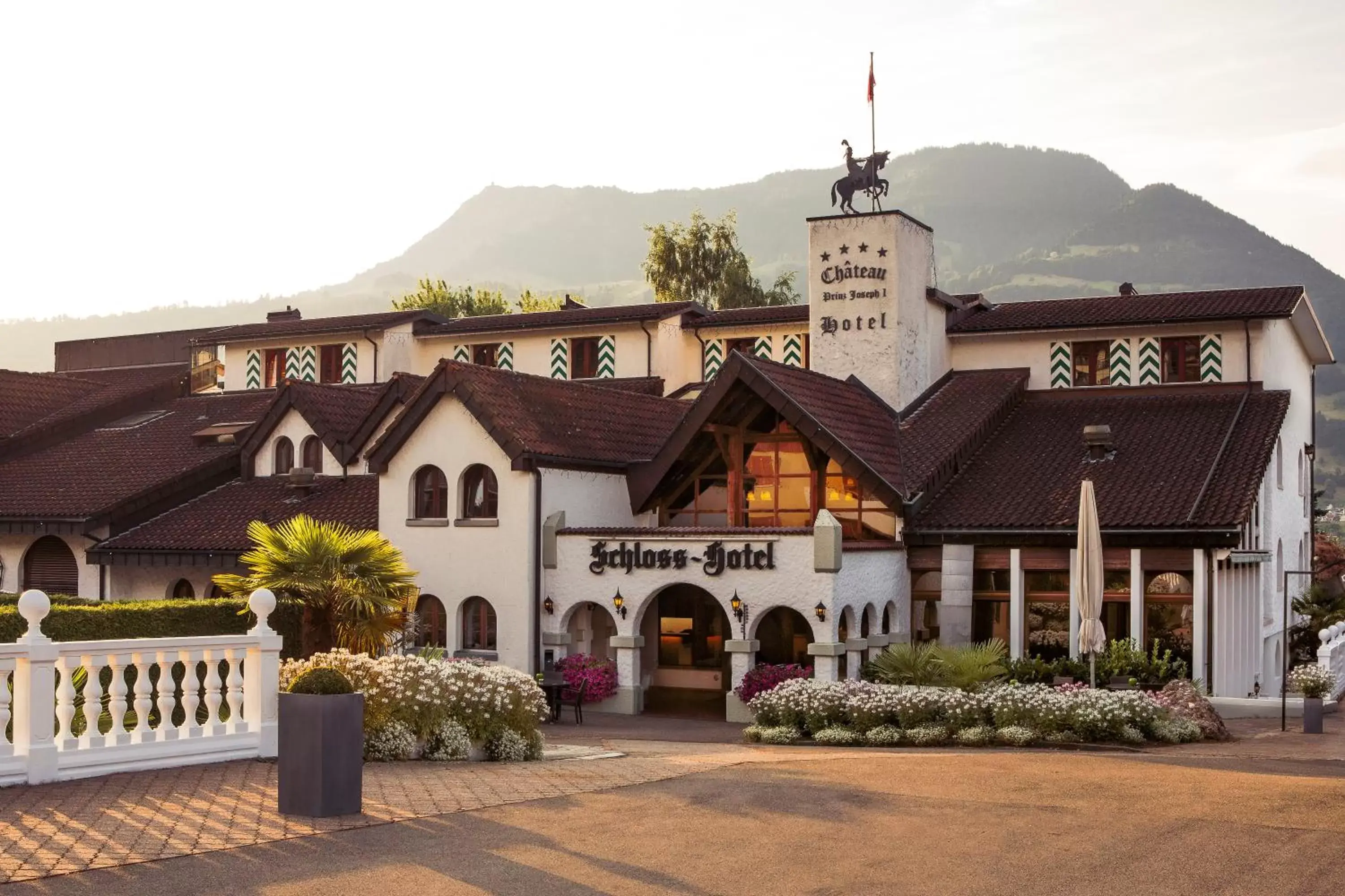 Facade/entrance, Property Building in Swiss-Chalet Merlischachen - Romantik Schloss-Hotel am See