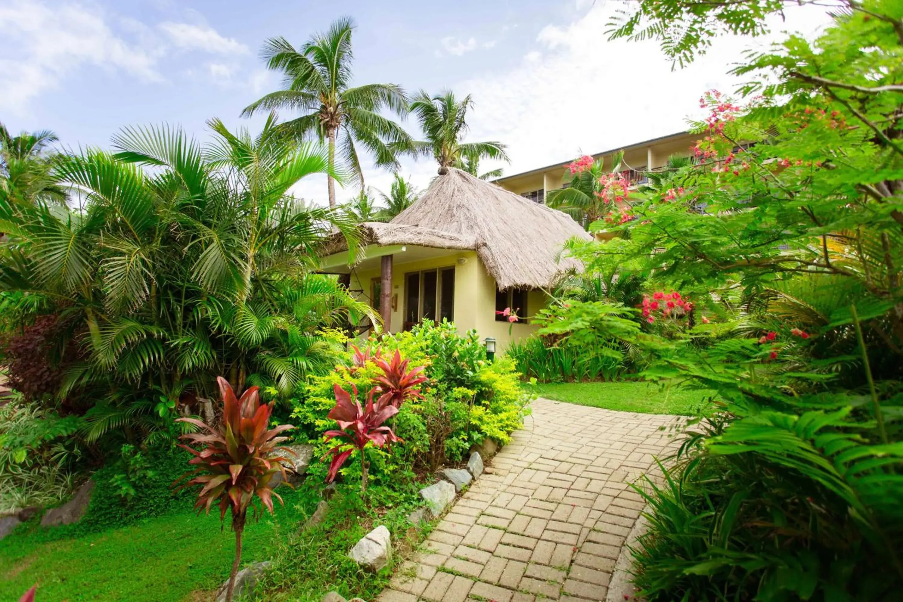 Bedroom, Property Building in Outrigger Fiji Beach Resort