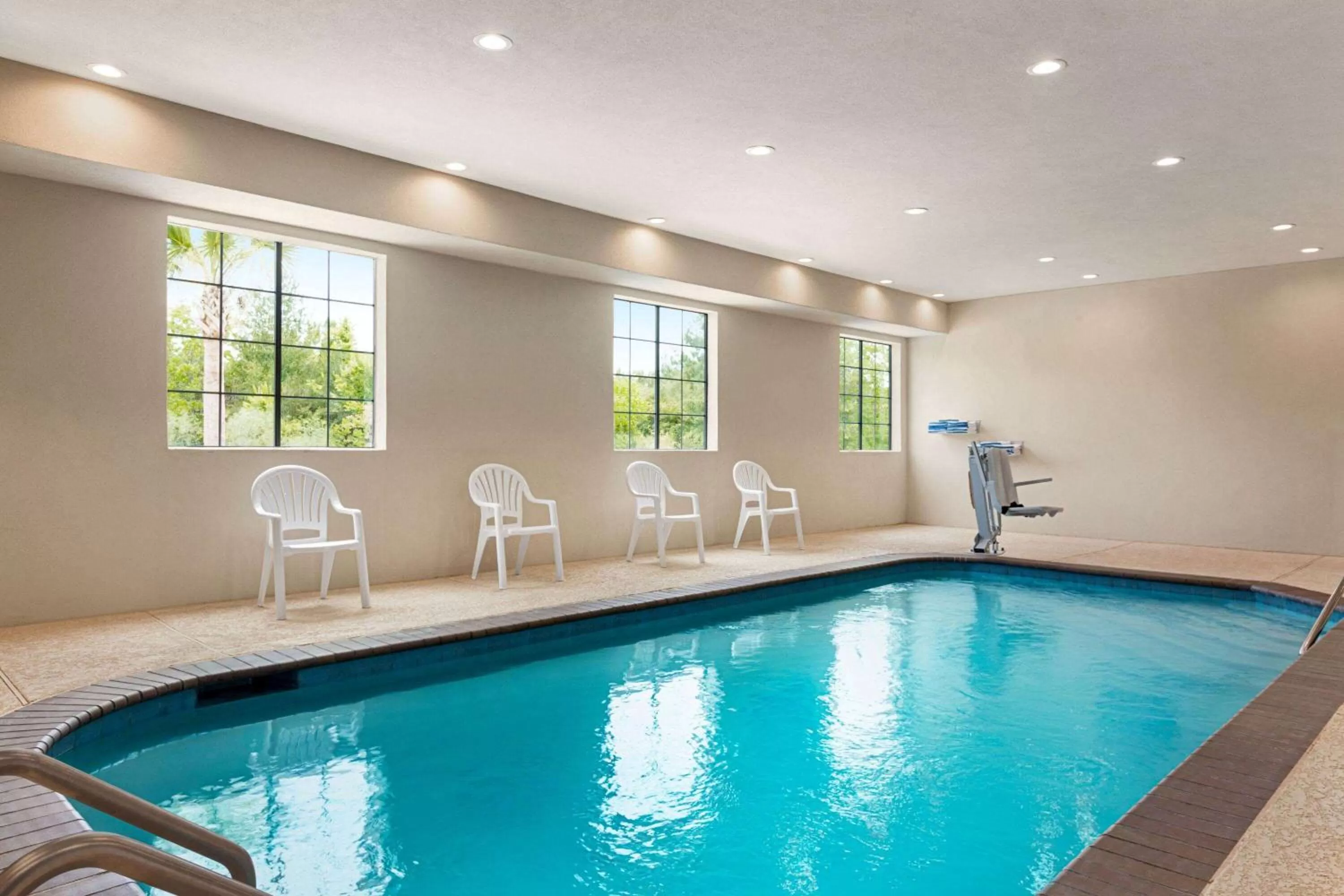 Swimming pool in Days Inn & Suites by Wyndham Greater Tomball