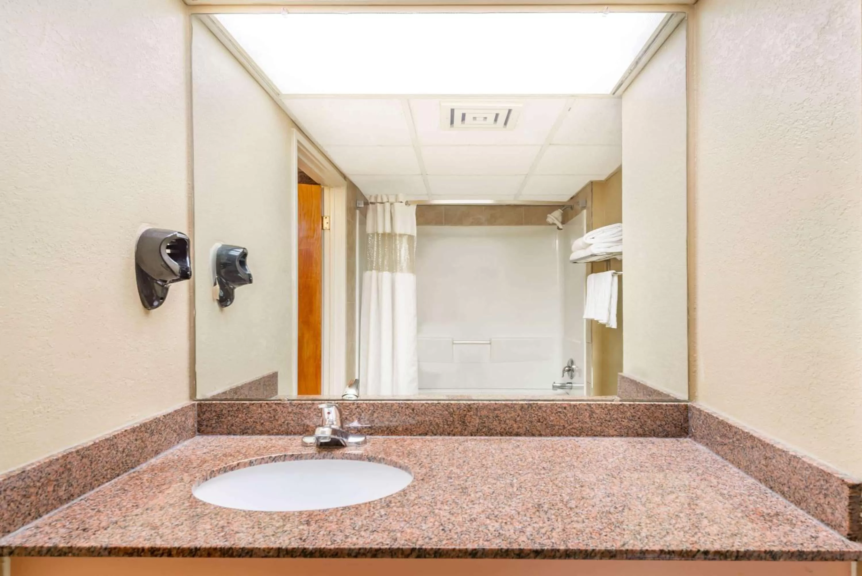 Bathroom in Ramada by Wyndham West Atlantic City