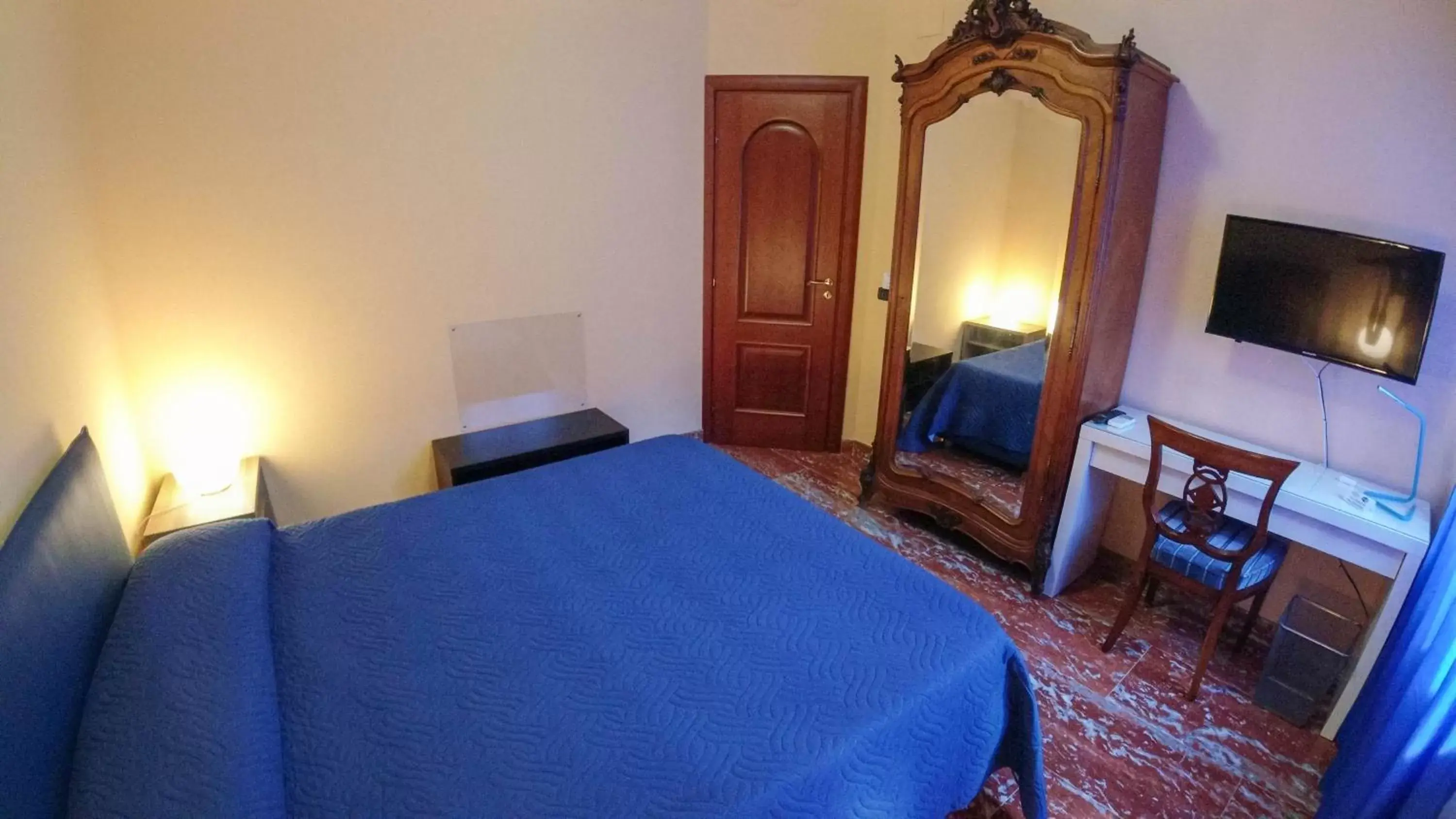 Bed in Il Piccolo Hotel