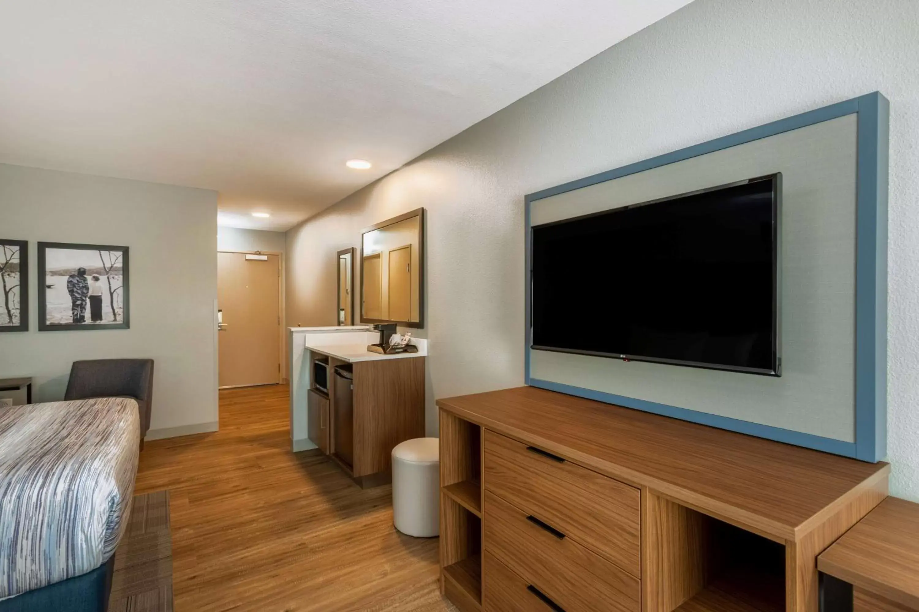 Photo of the whole room, TV/Entertainment Center in AmericInn by Wyndham San Angelo