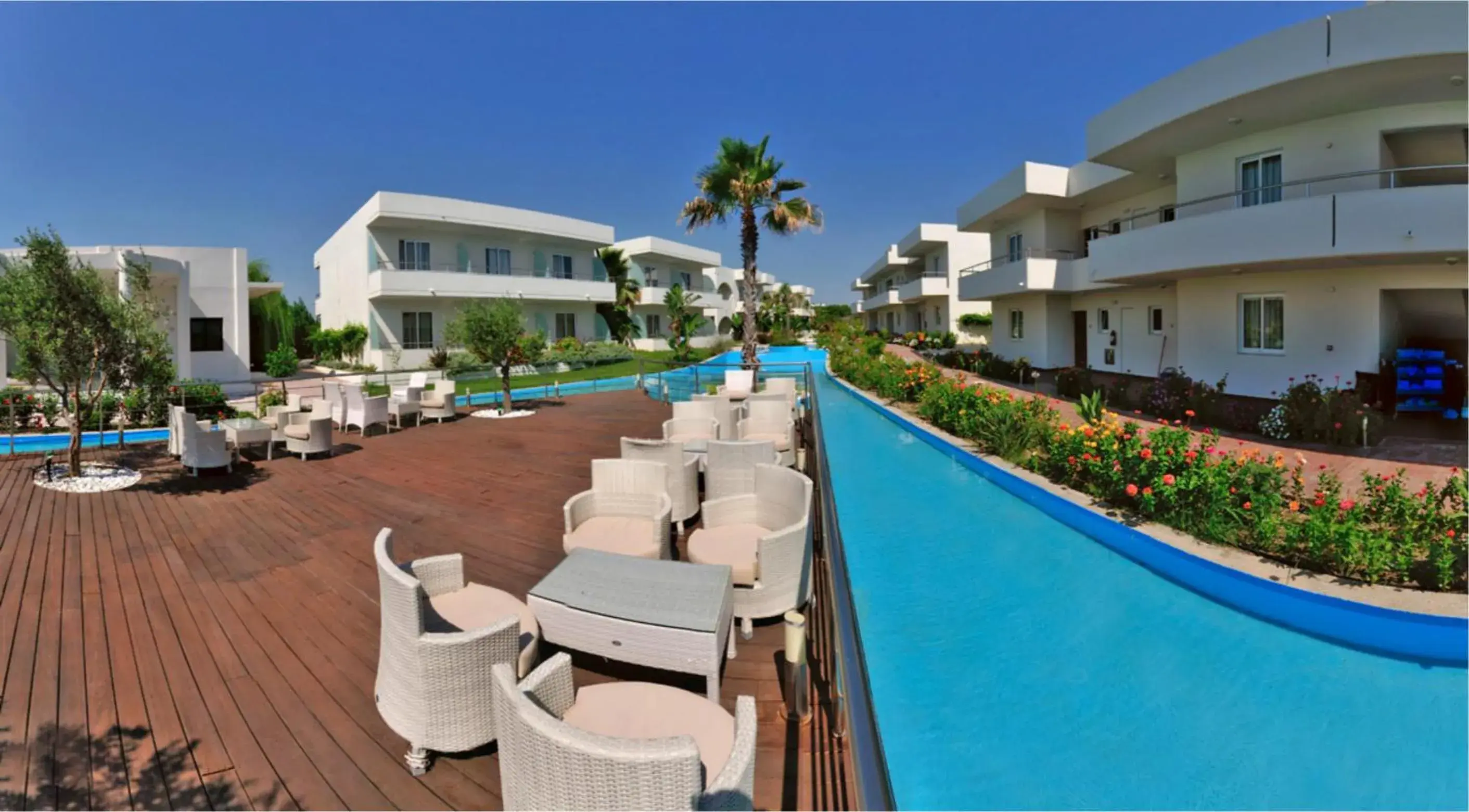 Communal lounge/ TV room, Pool View in Afandou Bay Resort Suites