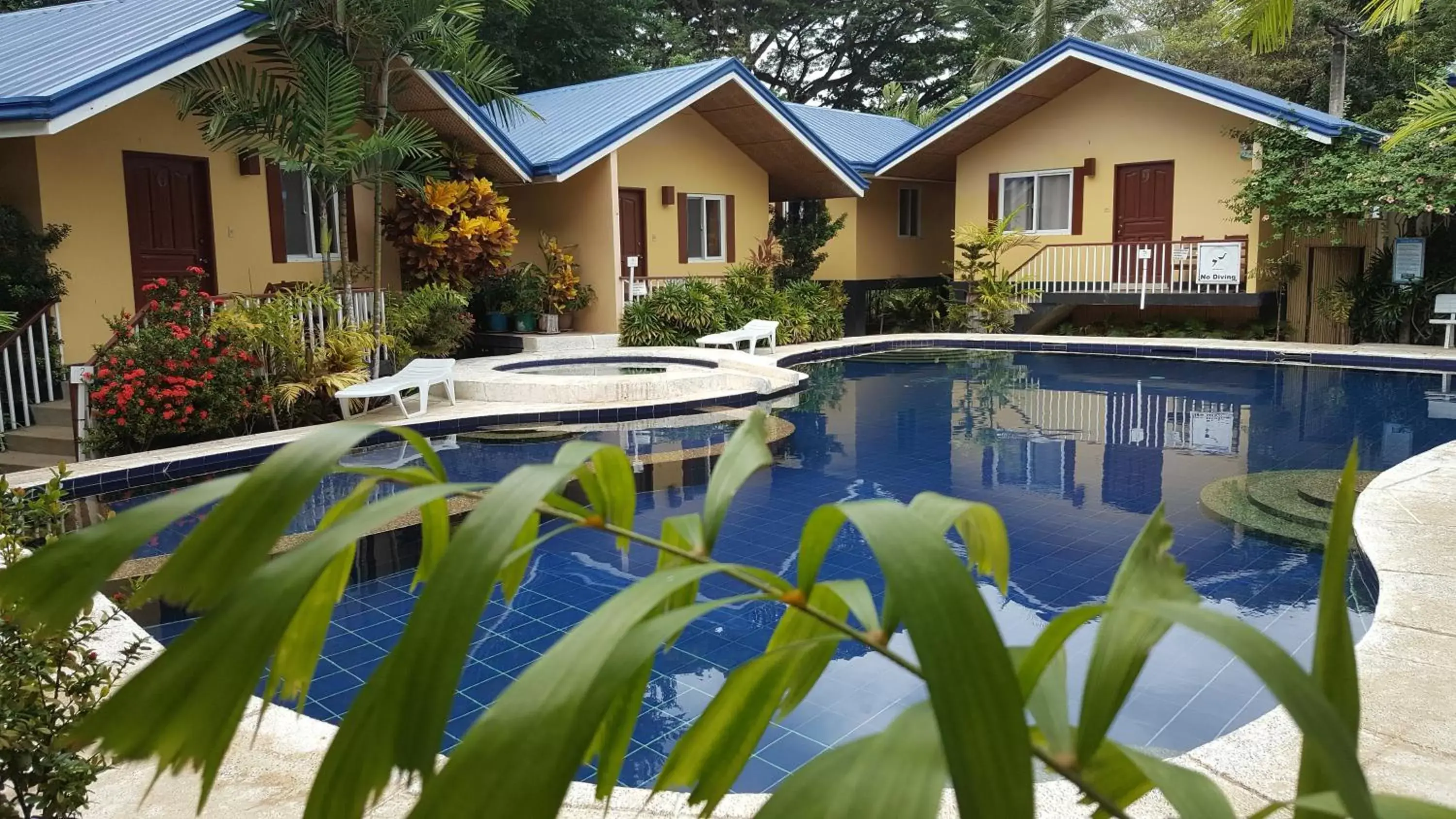 Garden view, Swimming Pool in Blue Lagoon Inn & Suites