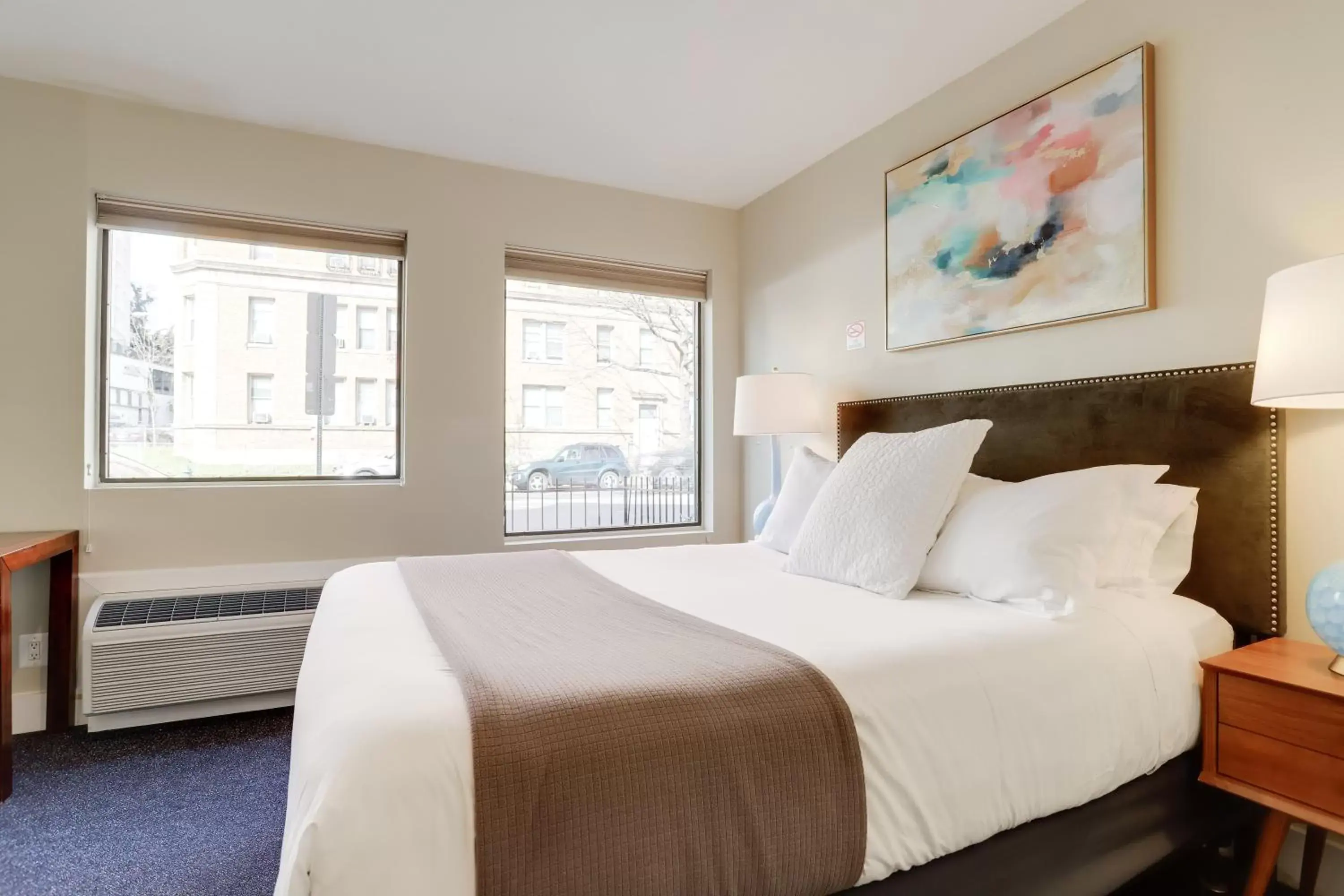 Bed in Sojourn at DuPont Place