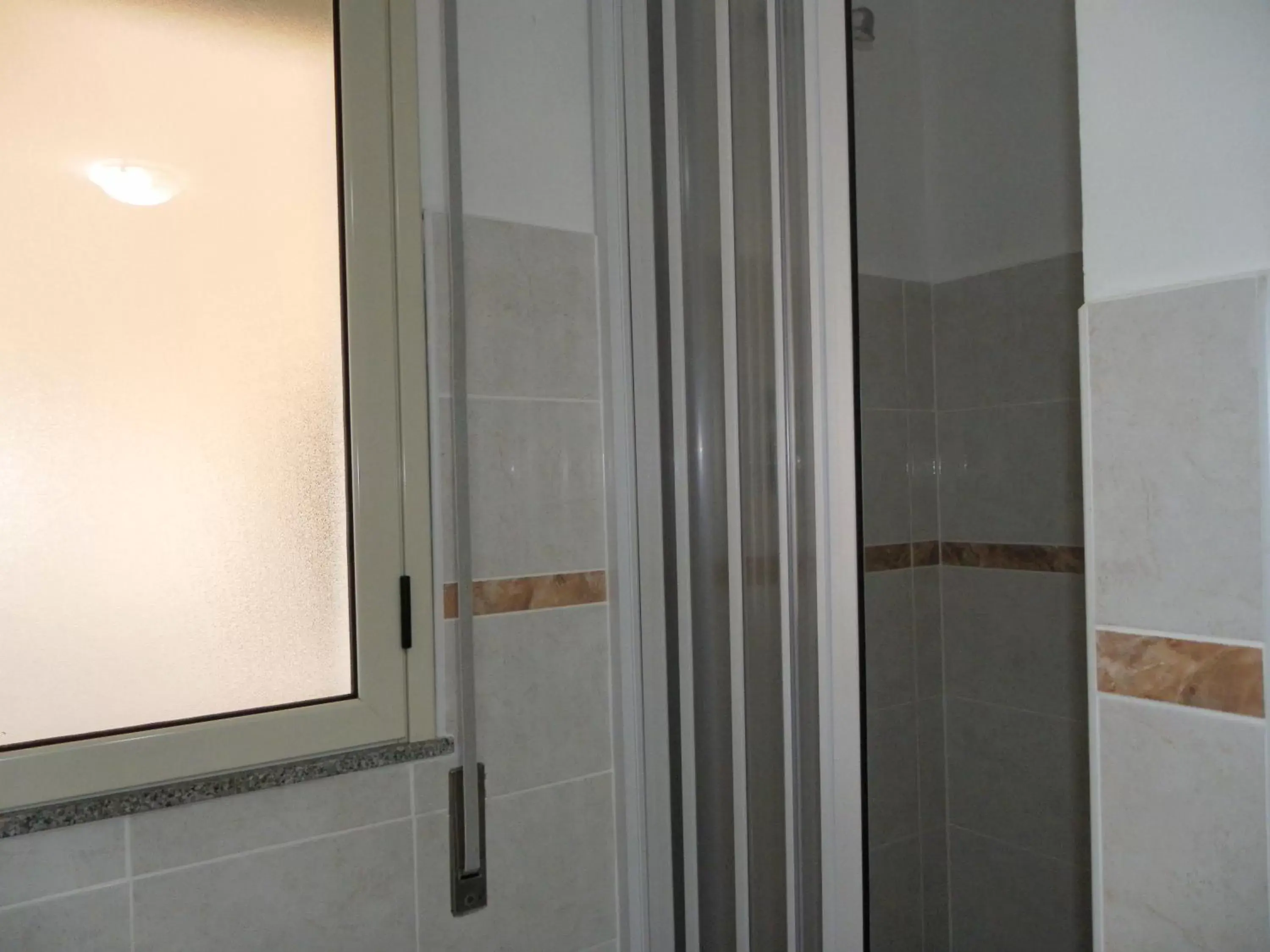 Shower, Bathroom in Residence Santa Barbara