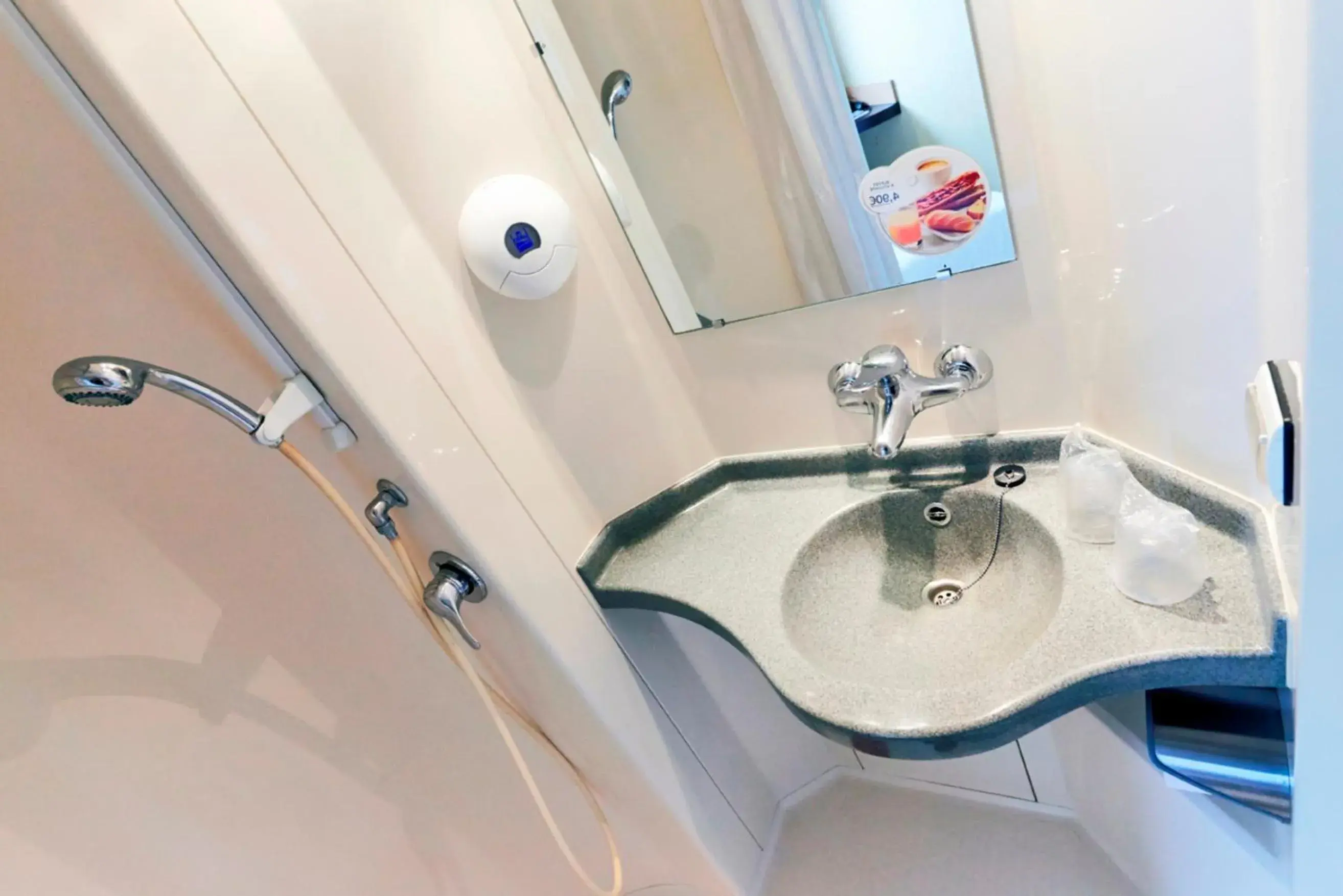 Shower, Bathroom in Première Classe Paris-Ouest Gennevilliers