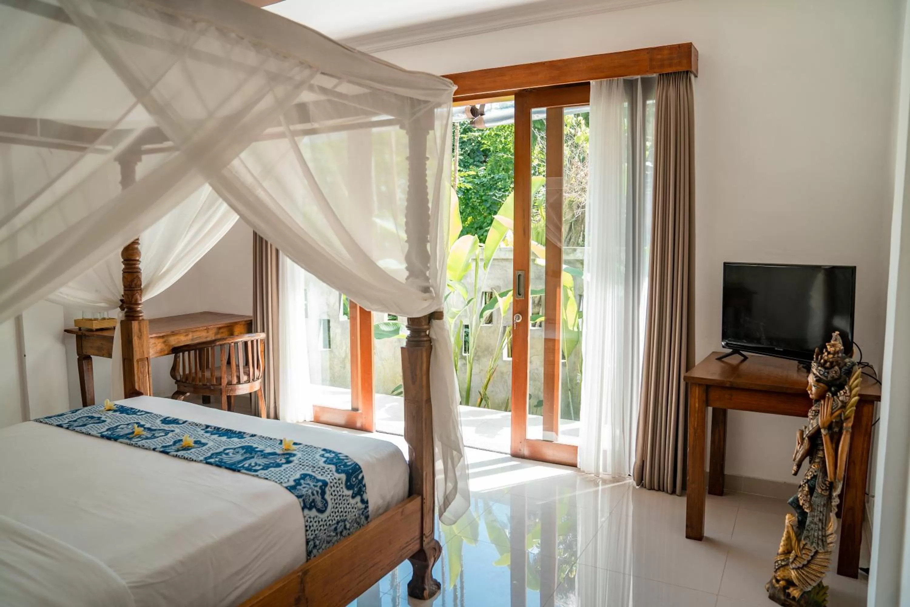 Bed in Gusde Tranquil Villas by EPS