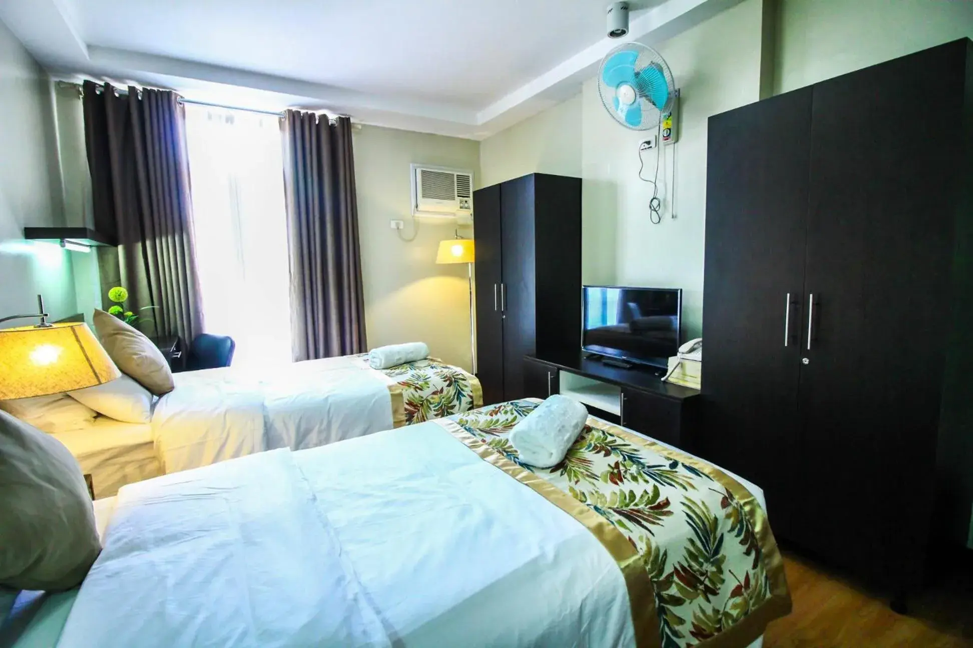 Bed in The Studio 87 Residences