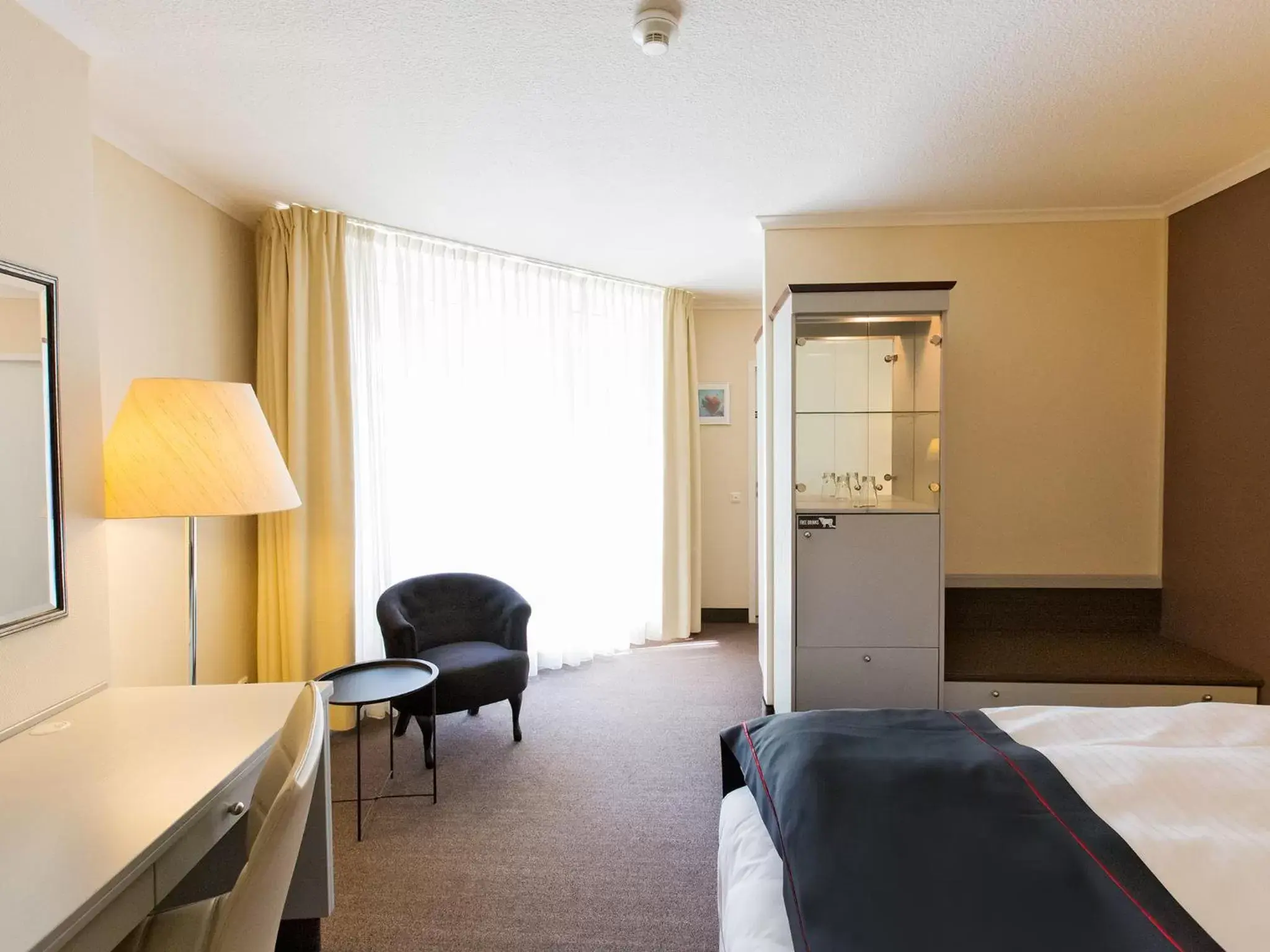 Photo of the whole room, Seating Area in DORMERO Hotel Dessau-Roßlau