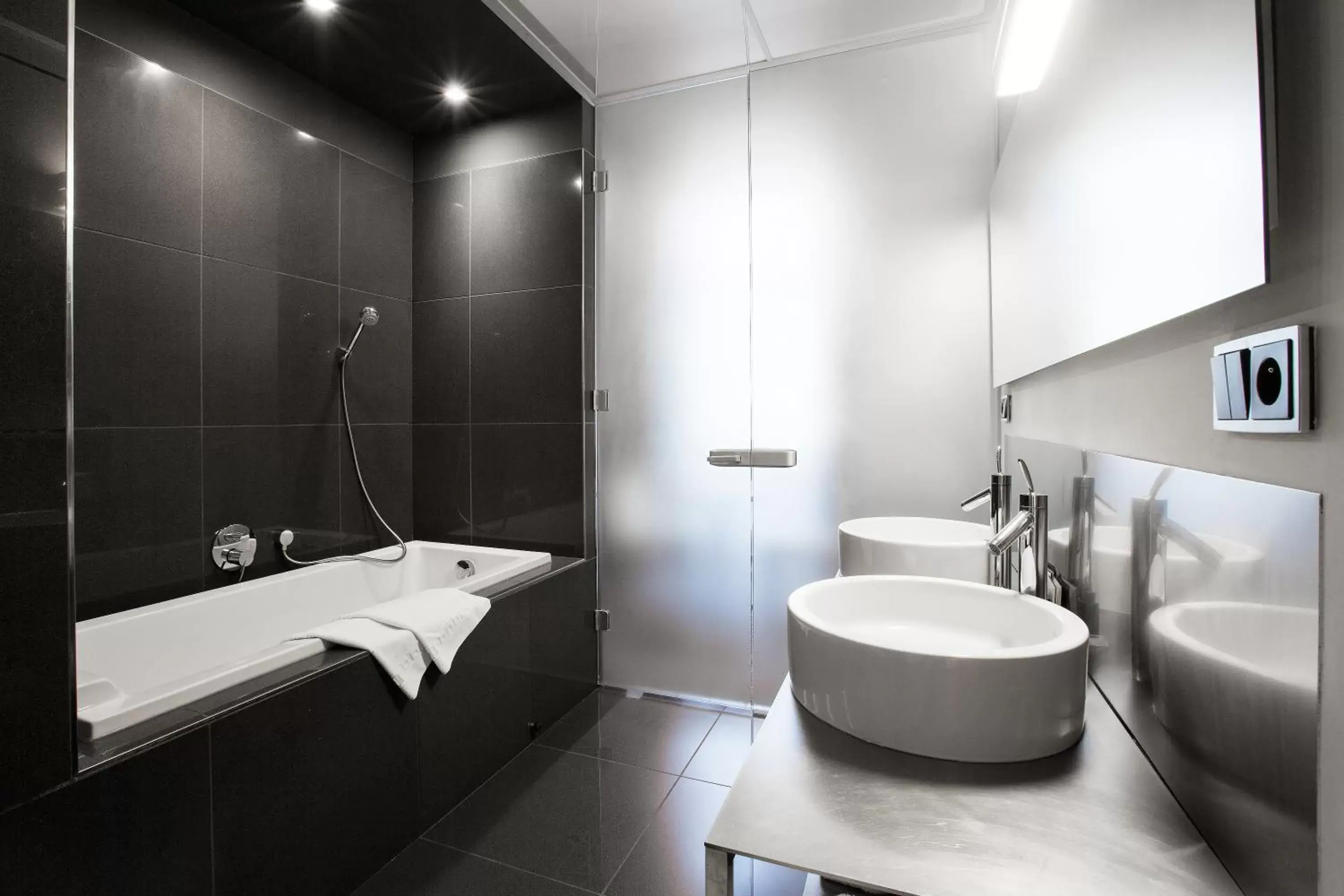 Bathroom in Old Town Square Residence by Emblem