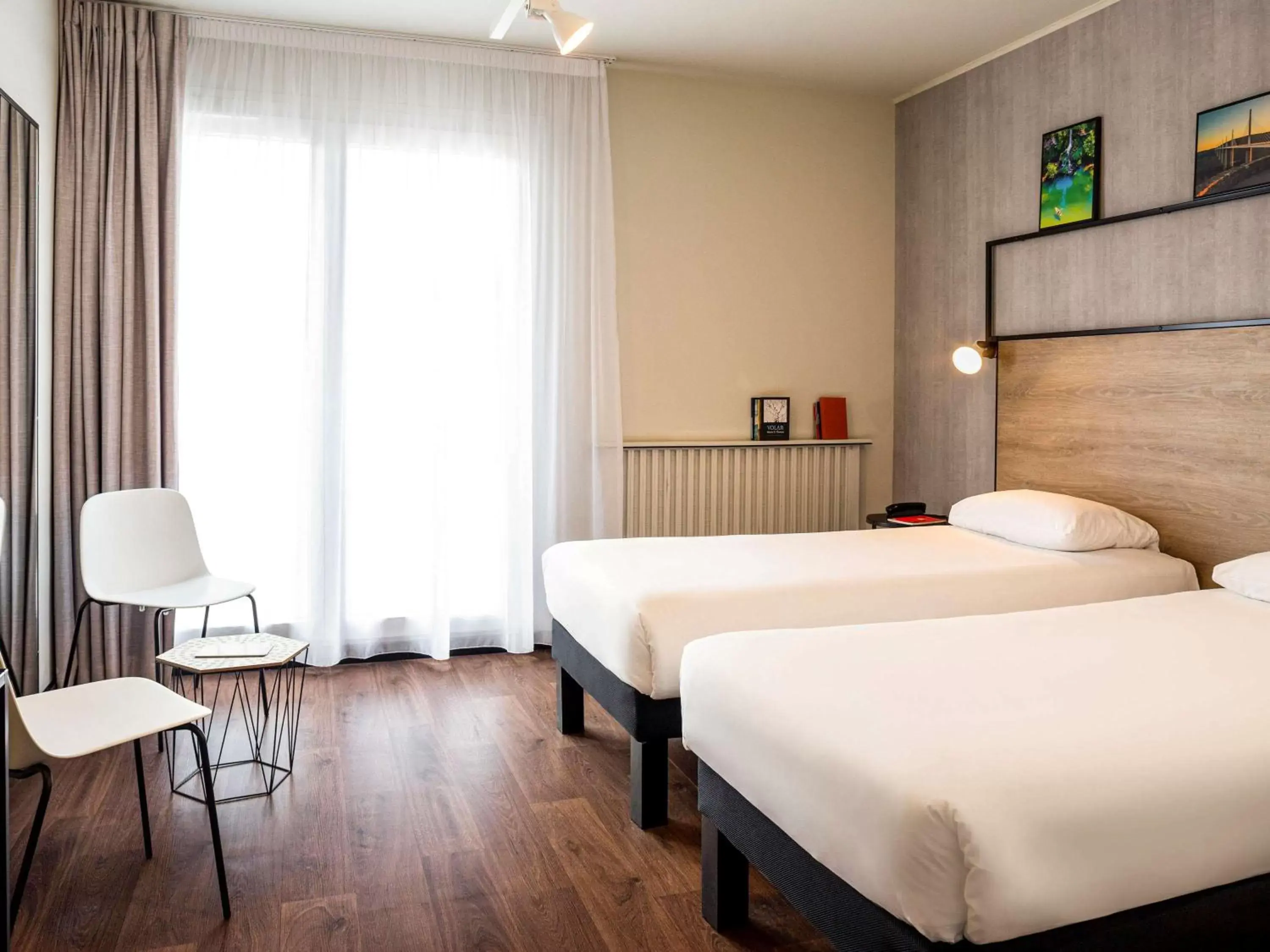 Photo of the whole room, Bed in Ibis Centre Millau