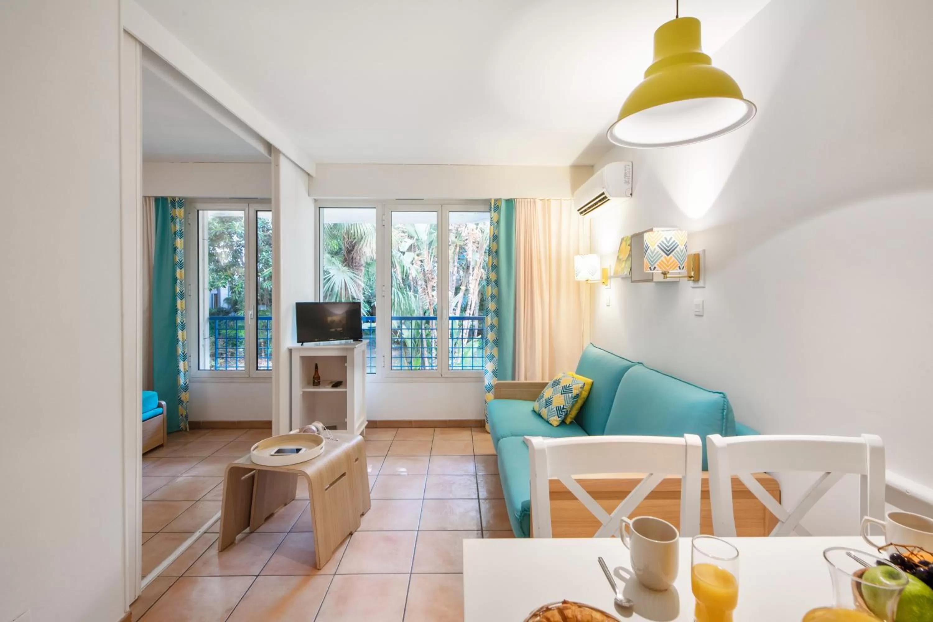 Communal lounge/ TV room in Résidence Pierre & Vacances Les Rivages Du Parc