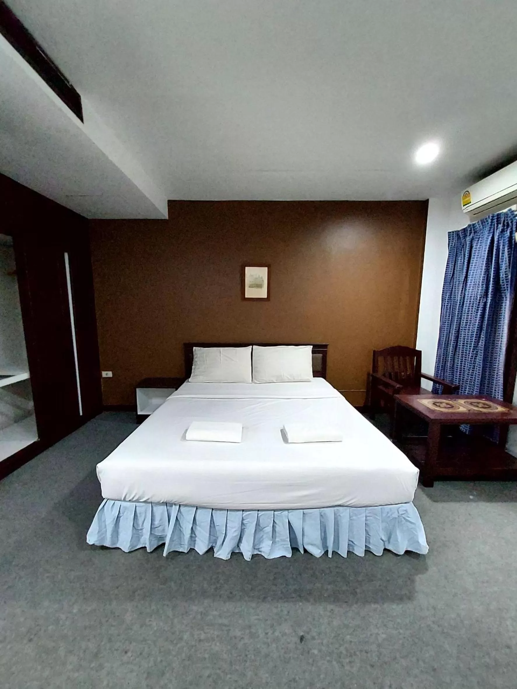 Bed in Traveller Inn Hotel