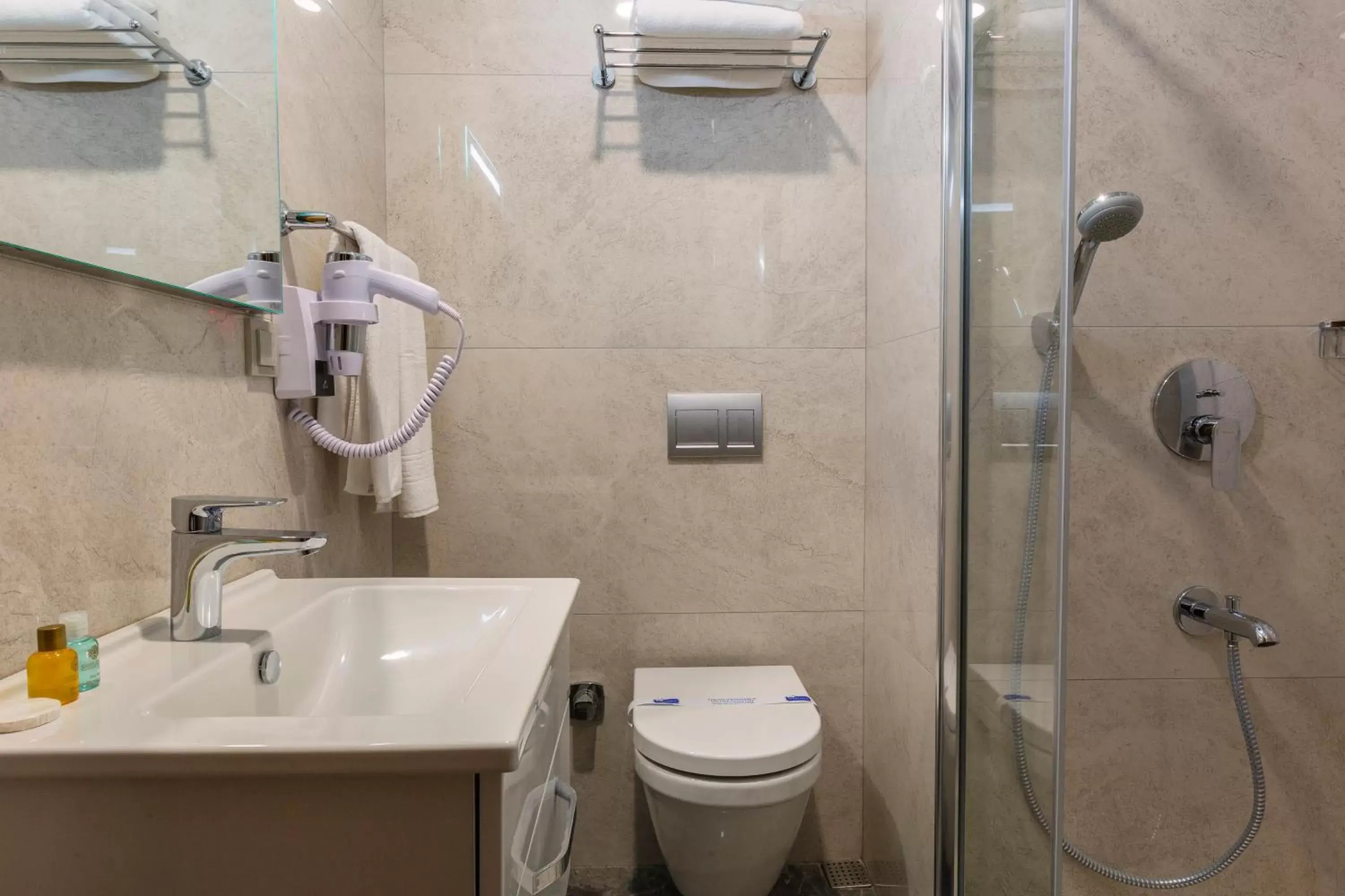 Bathroom in Obelisk Hotel & Suites