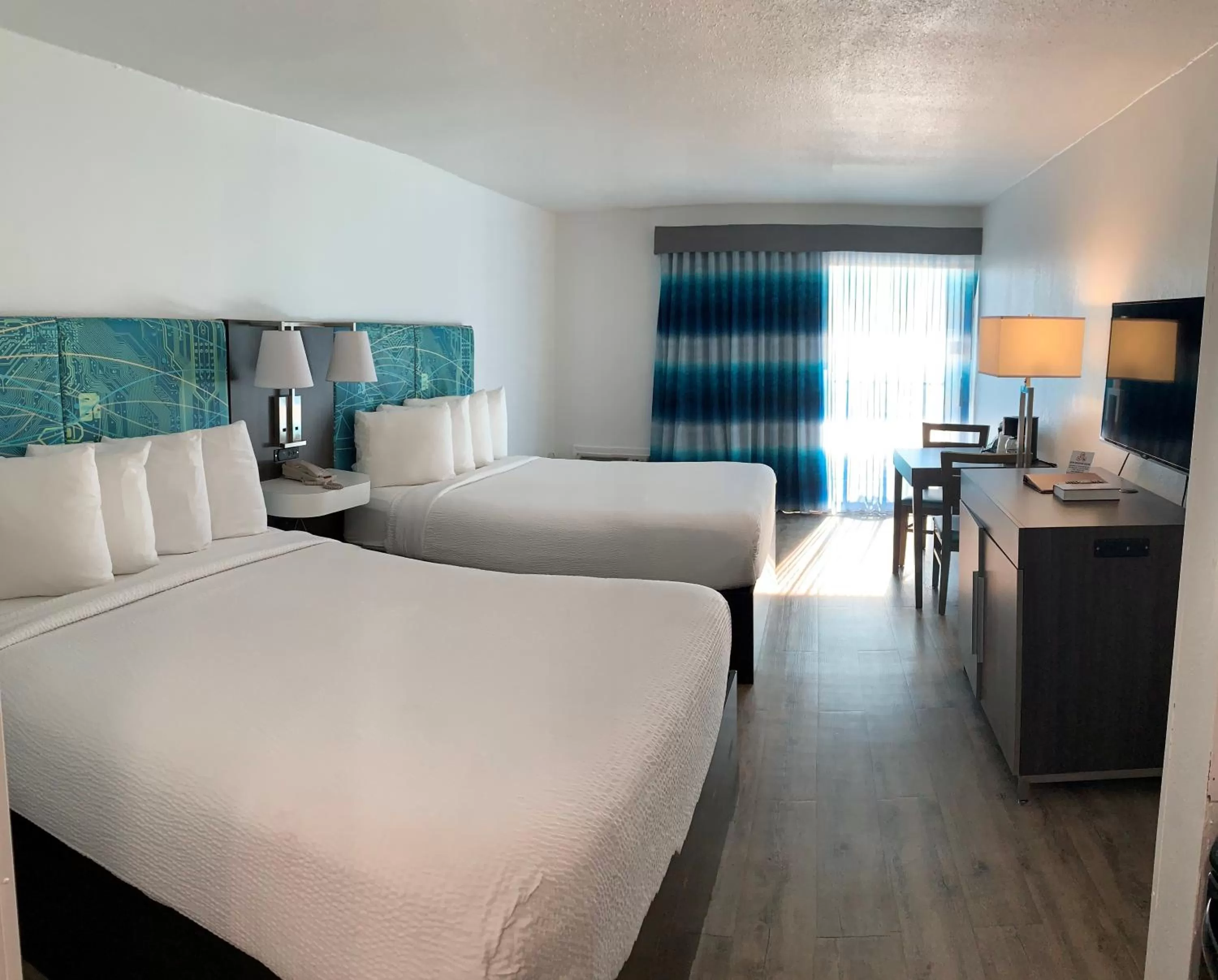 Bed in Tropical Seas Hotel