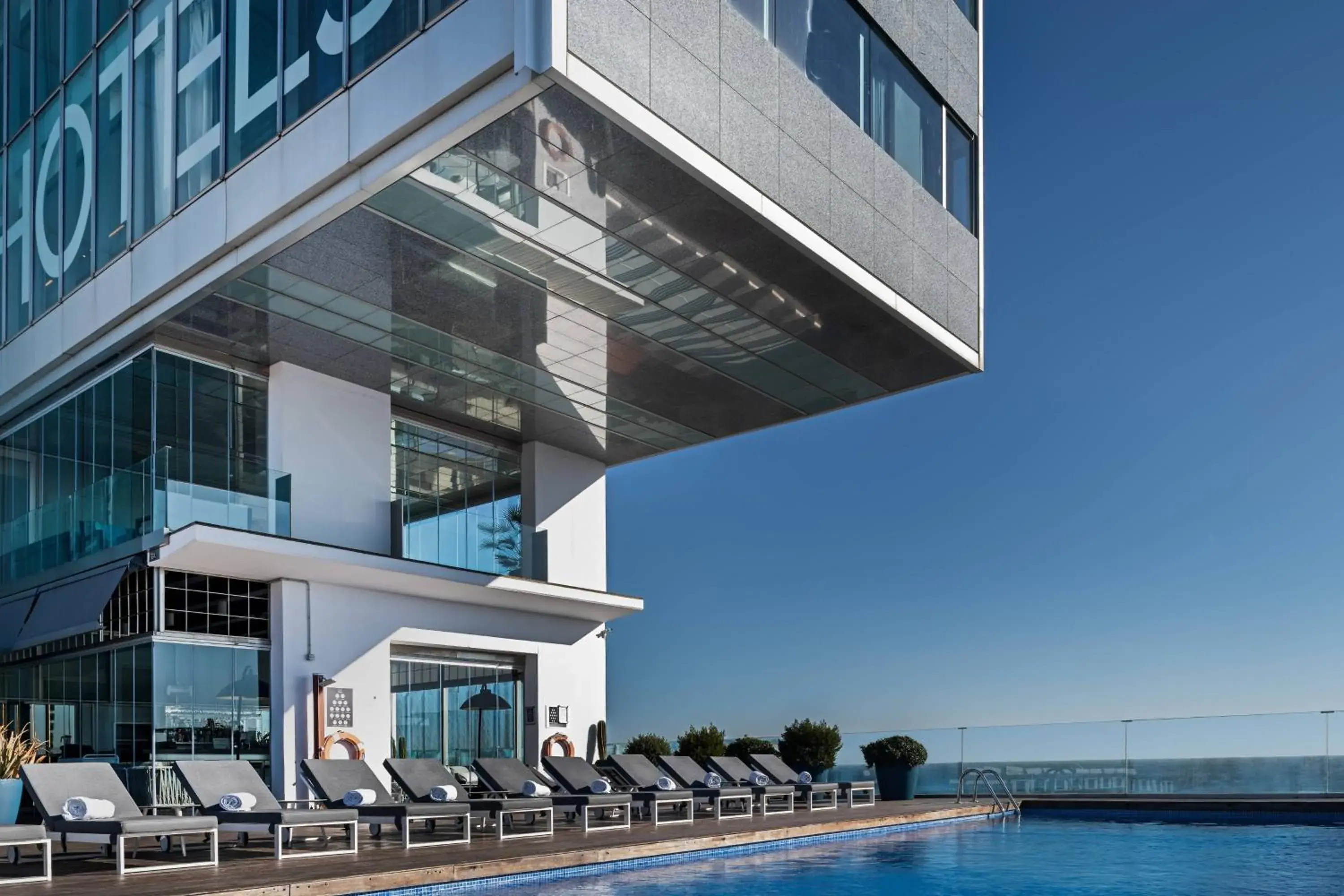 Swimming pool, Property Building in AC Hotel Barcelona Fórum by Marriott