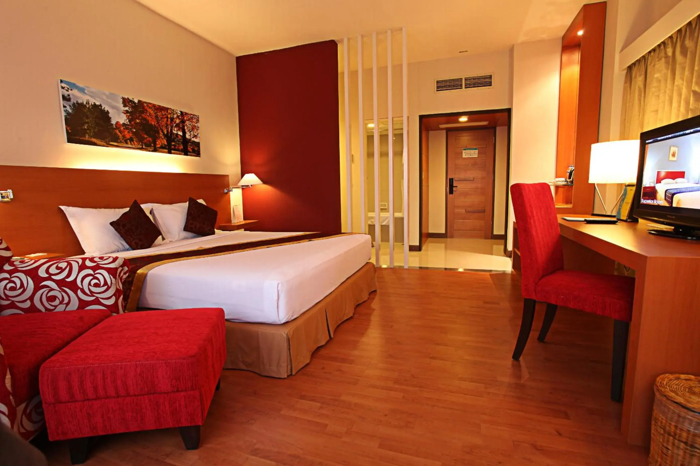 Photo of the whole room, Bed in Lux Tychi Hotel Malang