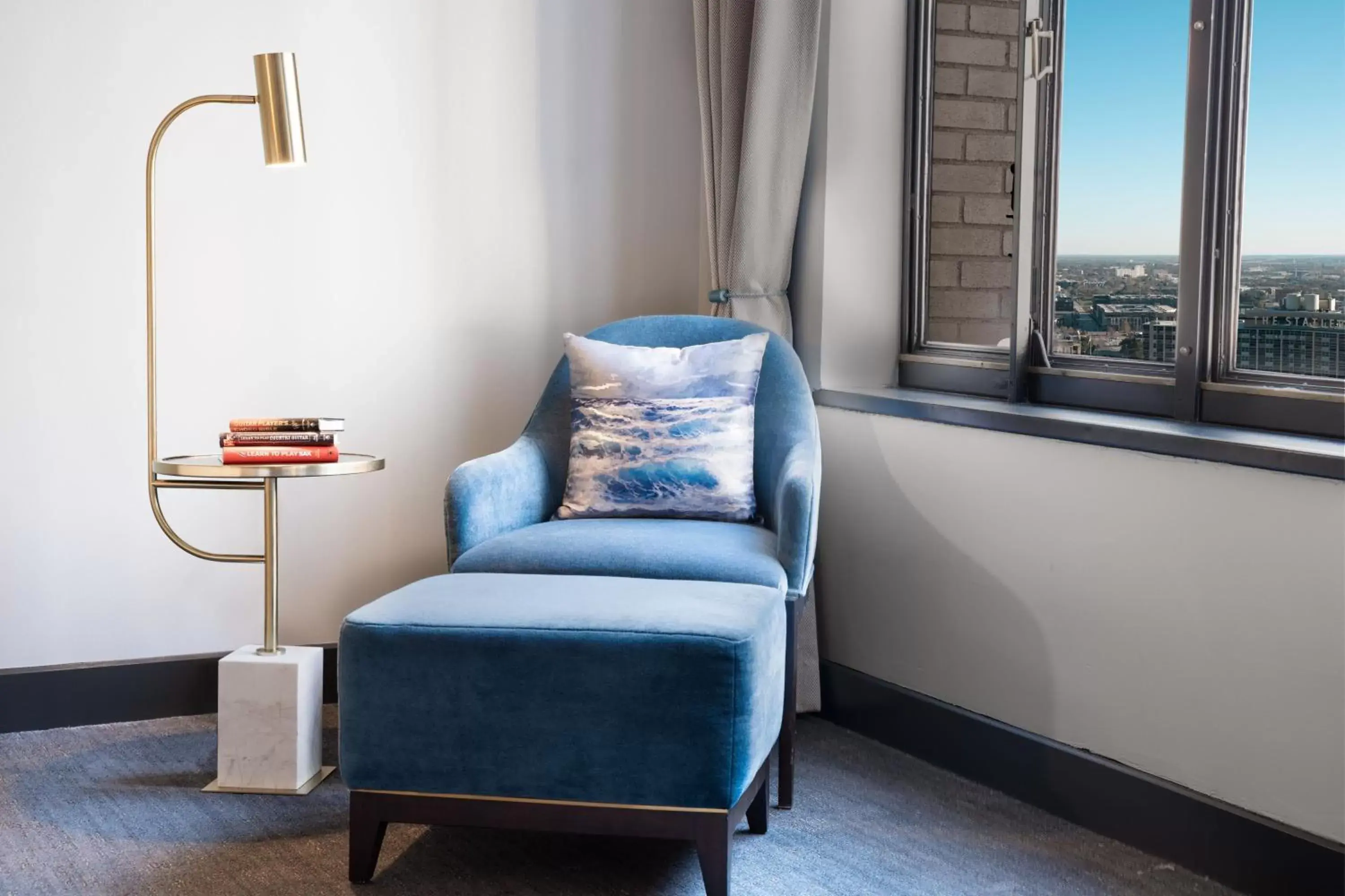 Photo of the whole room, Seating Area in Renaissance Saint Elm Dallas Downtown Hotel