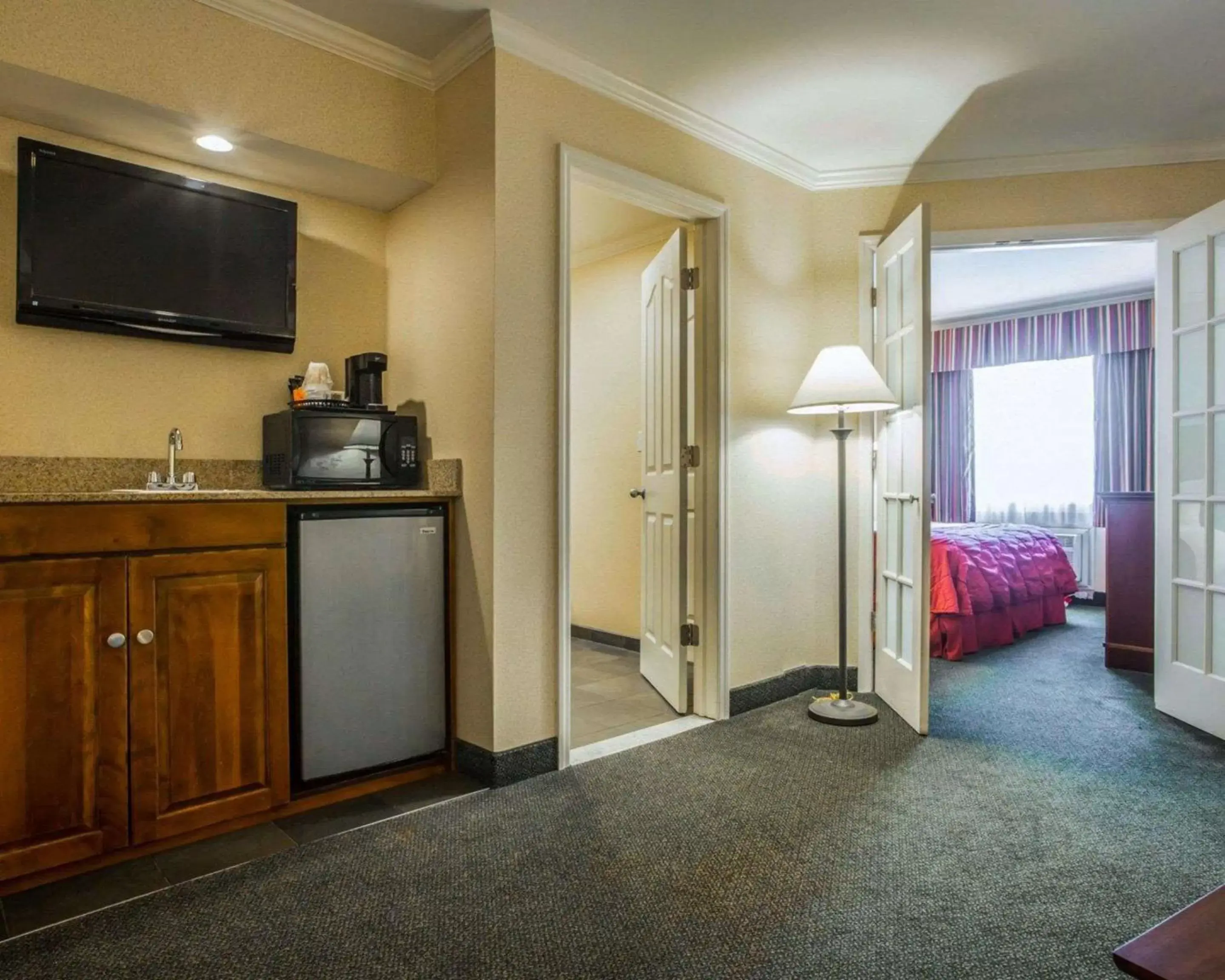 Photo of the whole room, TV/Entertainment Center in Clarion Inn & Suites Lake George