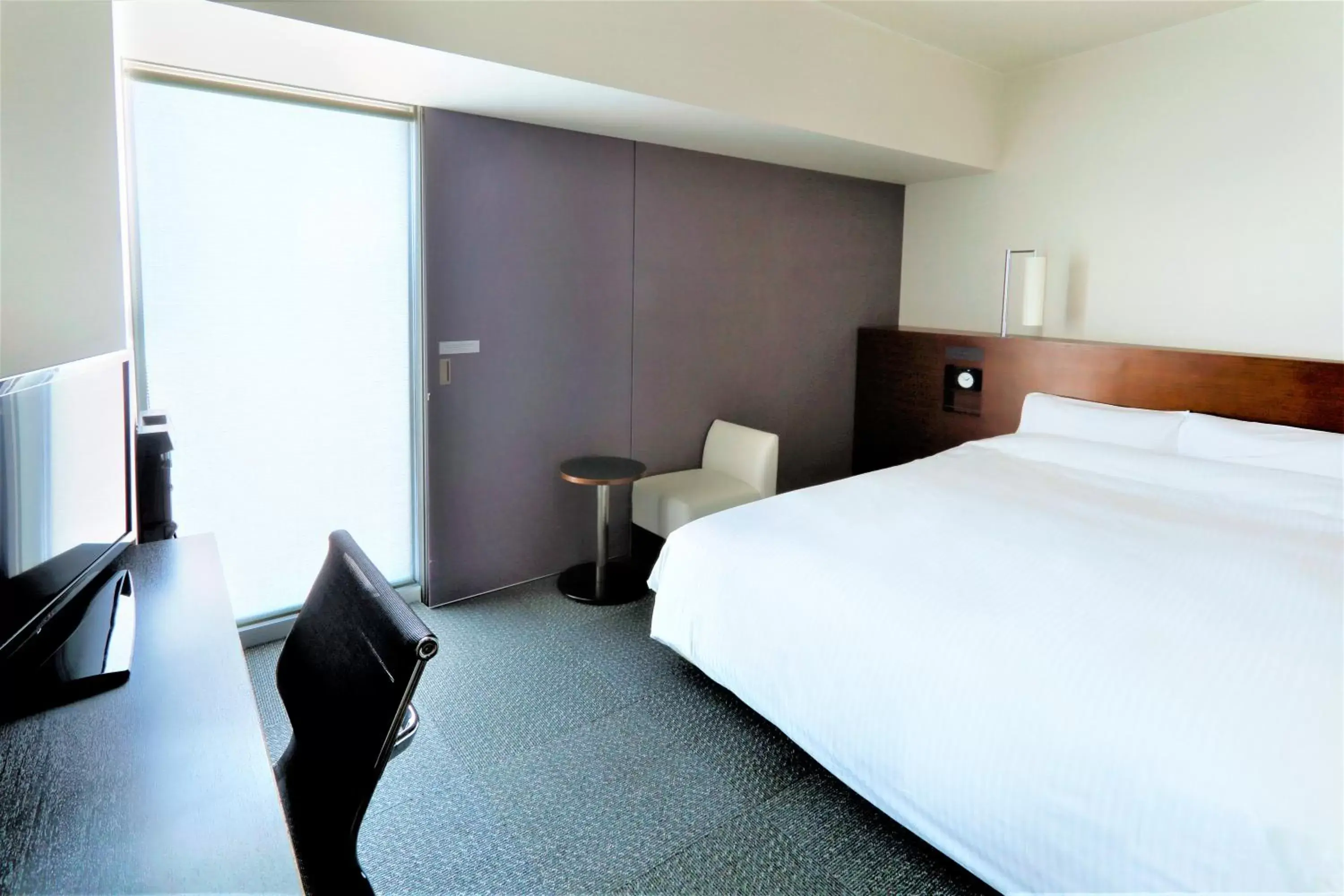 Bed in JR Inn Sapporo
