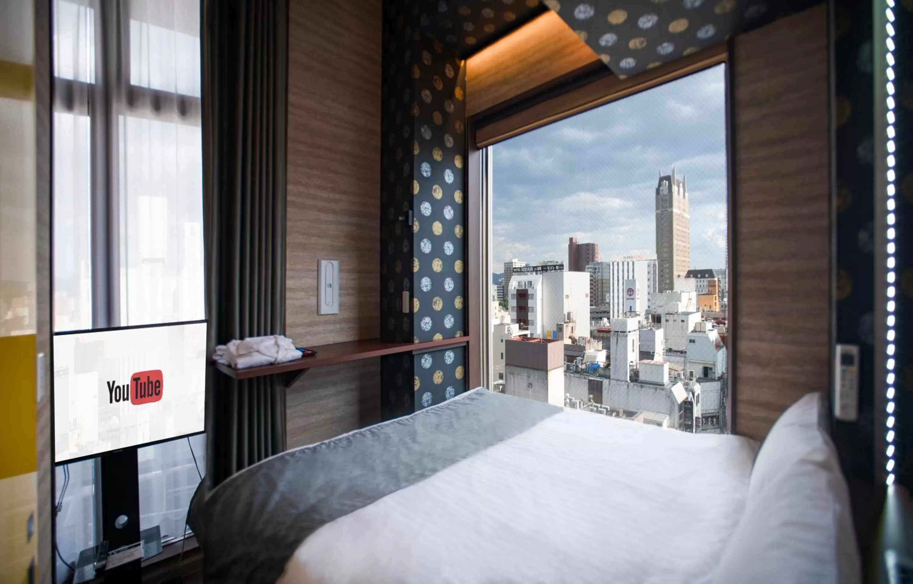 Bed in Hotel Xcell Hiroshima Nagarekawa