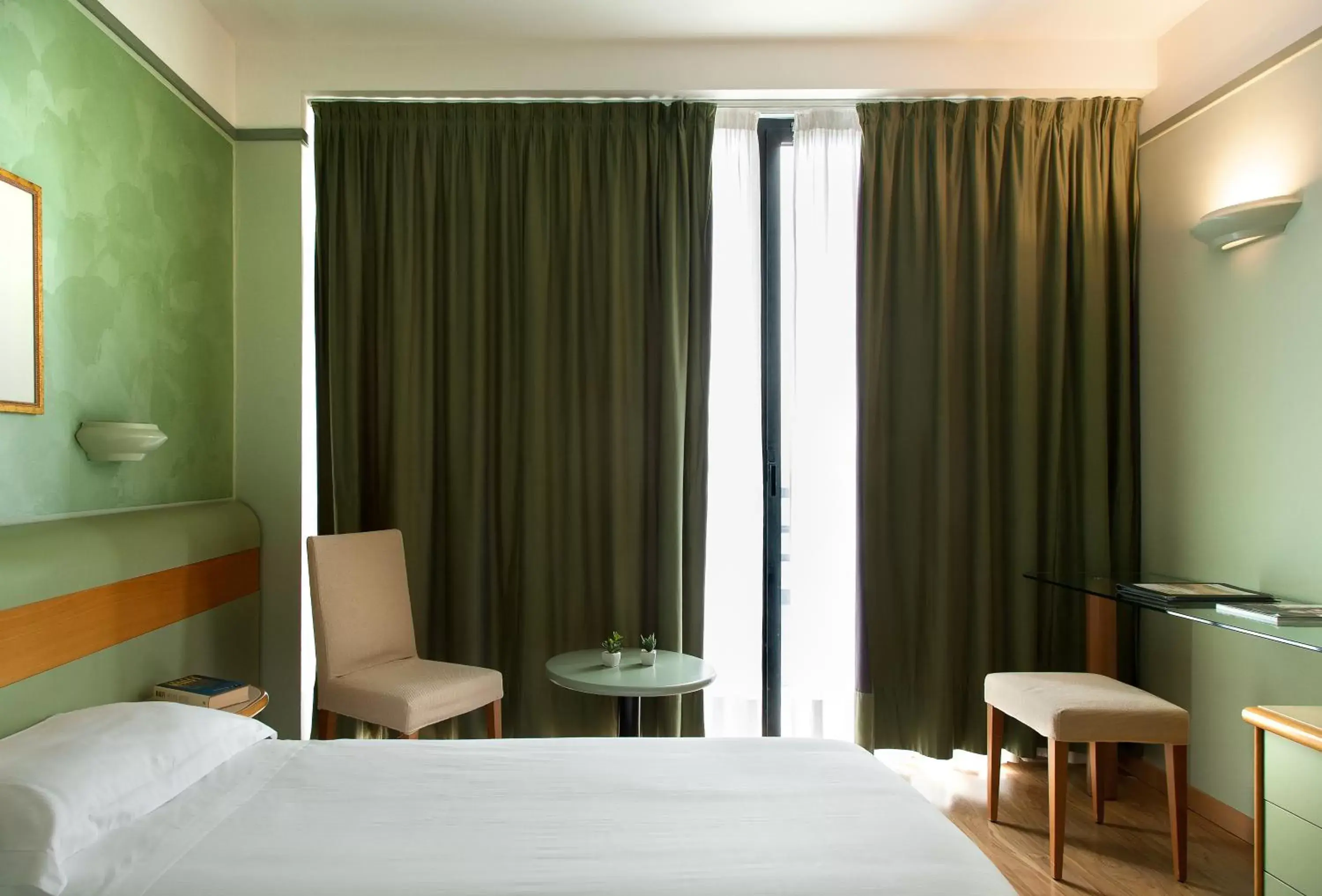 Bed in Hotel Leonardo da Vinci Bed in Hotel Leonardo da Vinci