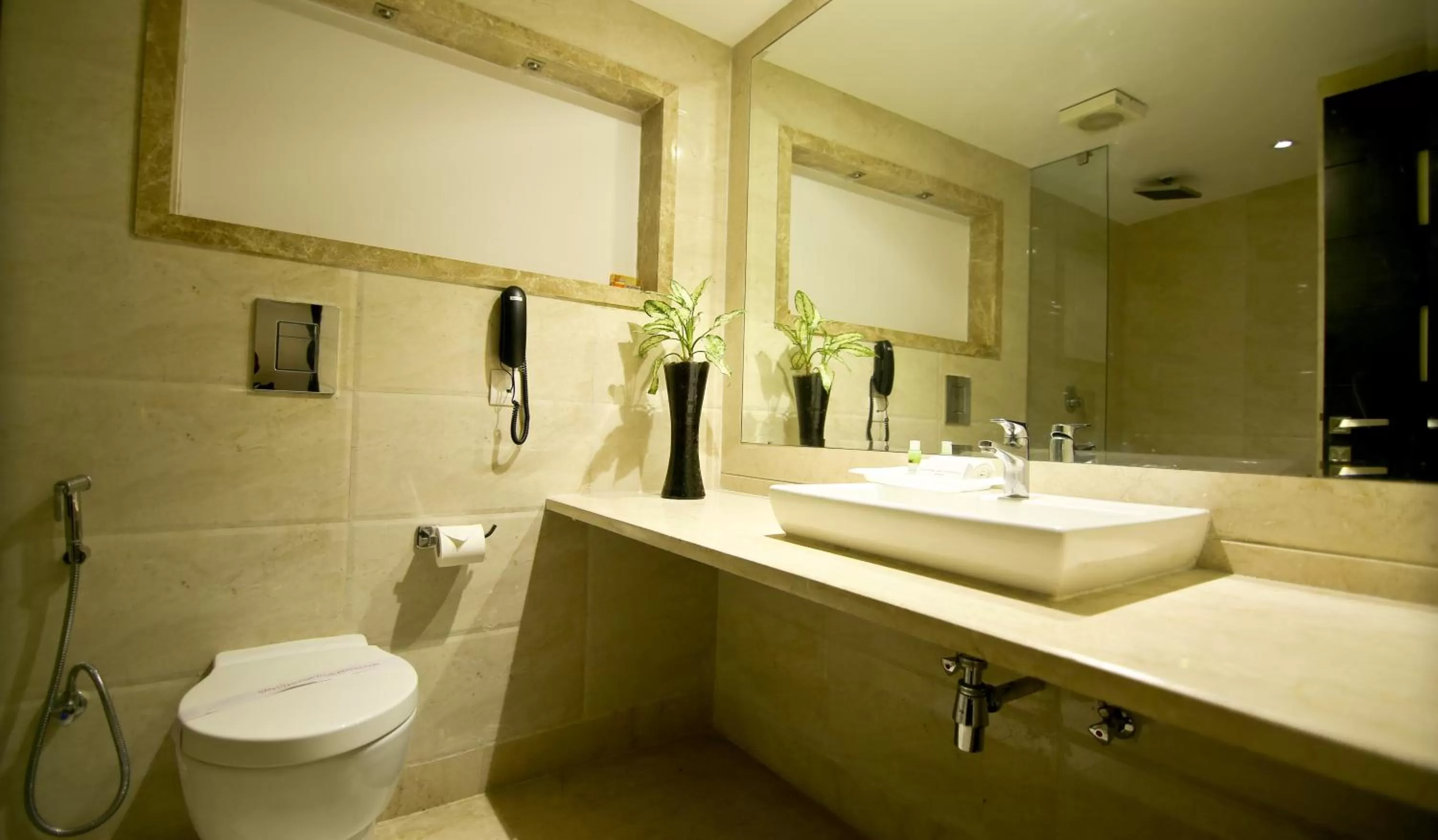 Bathroom in Hotel The Prime Balaji Deluxe, City Centre, With Free Airport Pickup