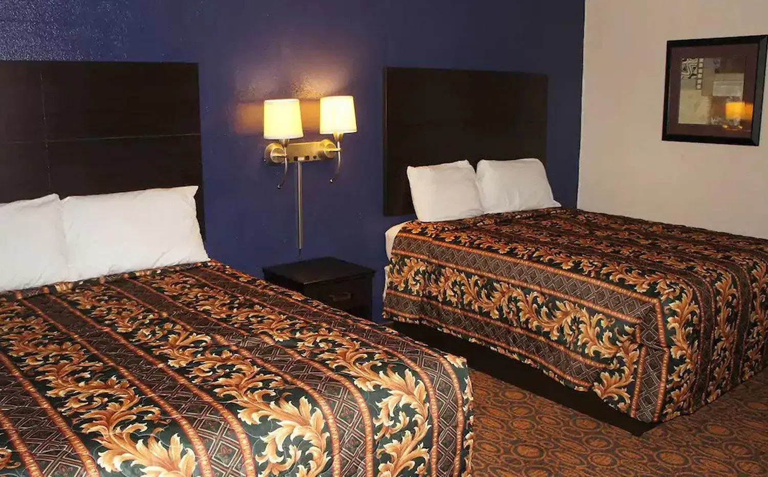 Bed in Coratel Inn & Suites by Jasper Waite Park