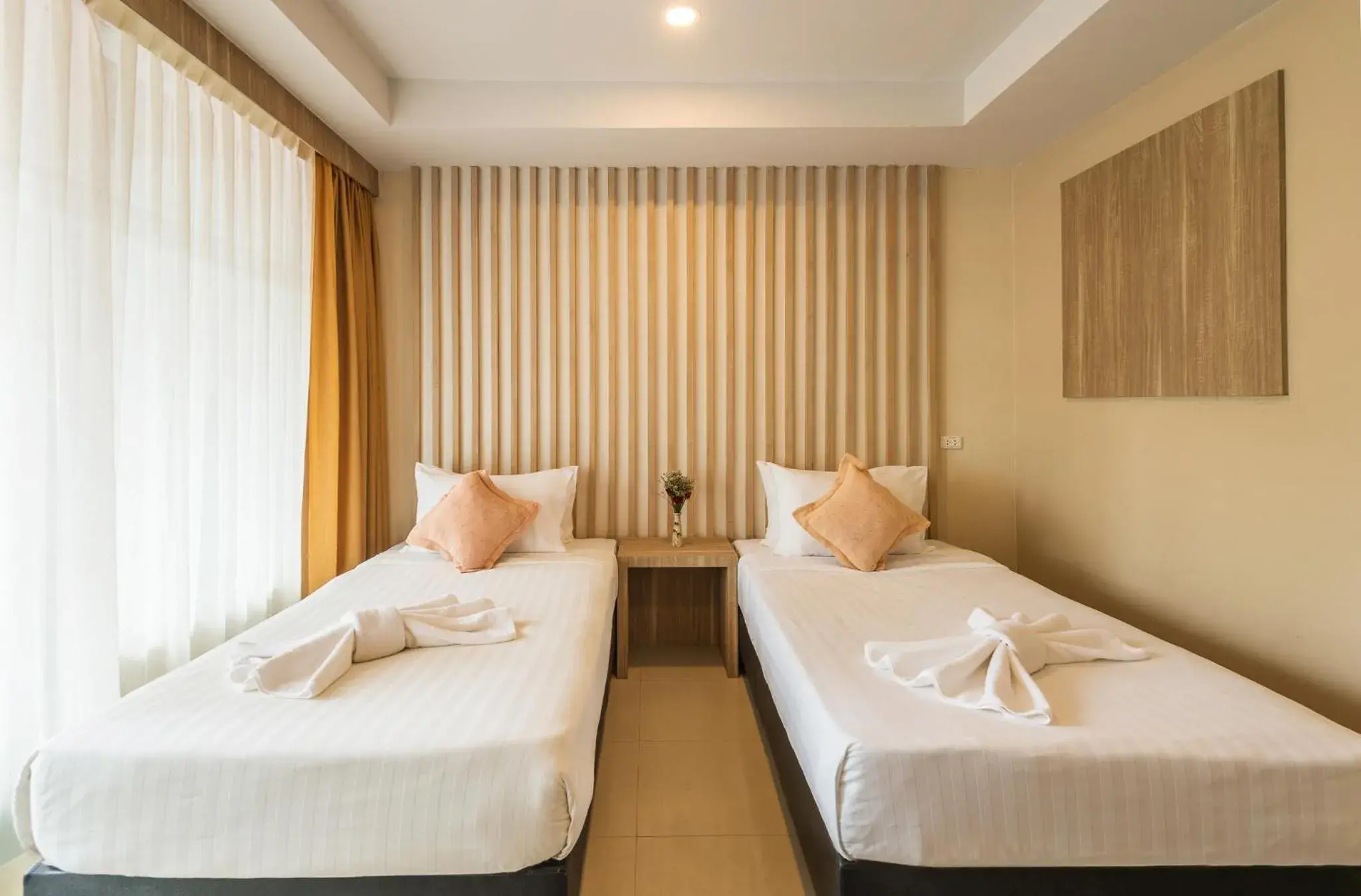 Bed in Lanta Sand Resort & Spa