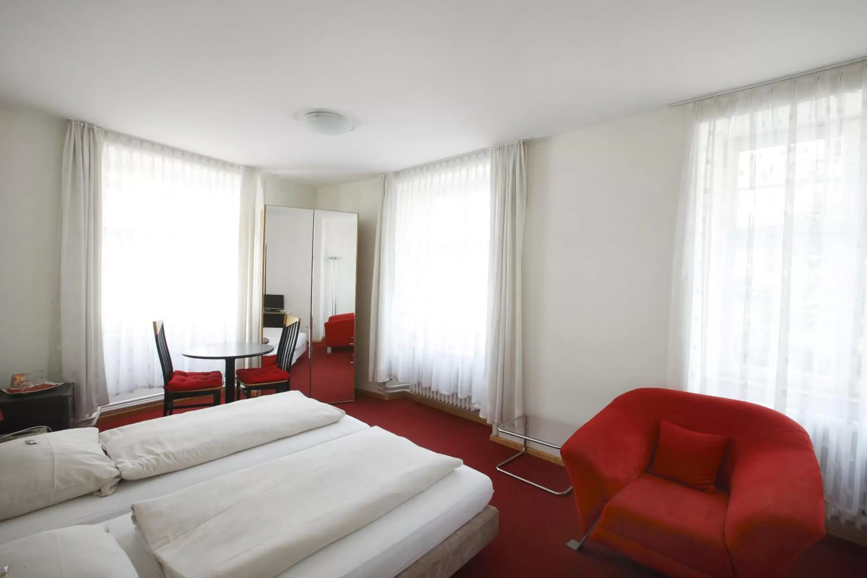 Bedroom in Spalenbrunnen Hotel & Restaurant Basel City Center