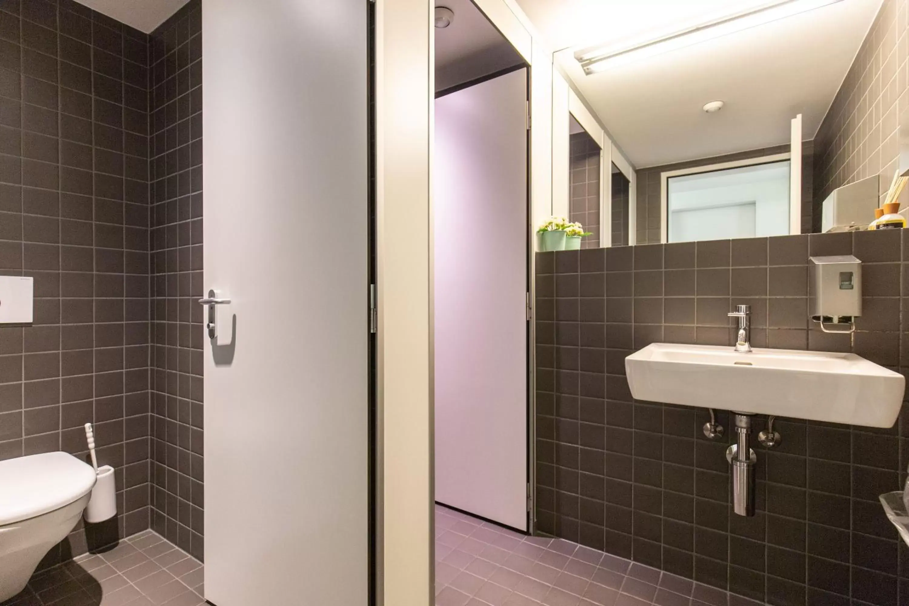 Toilet, Bathroom in Hotel & Lounge by Hyve Basel SBB