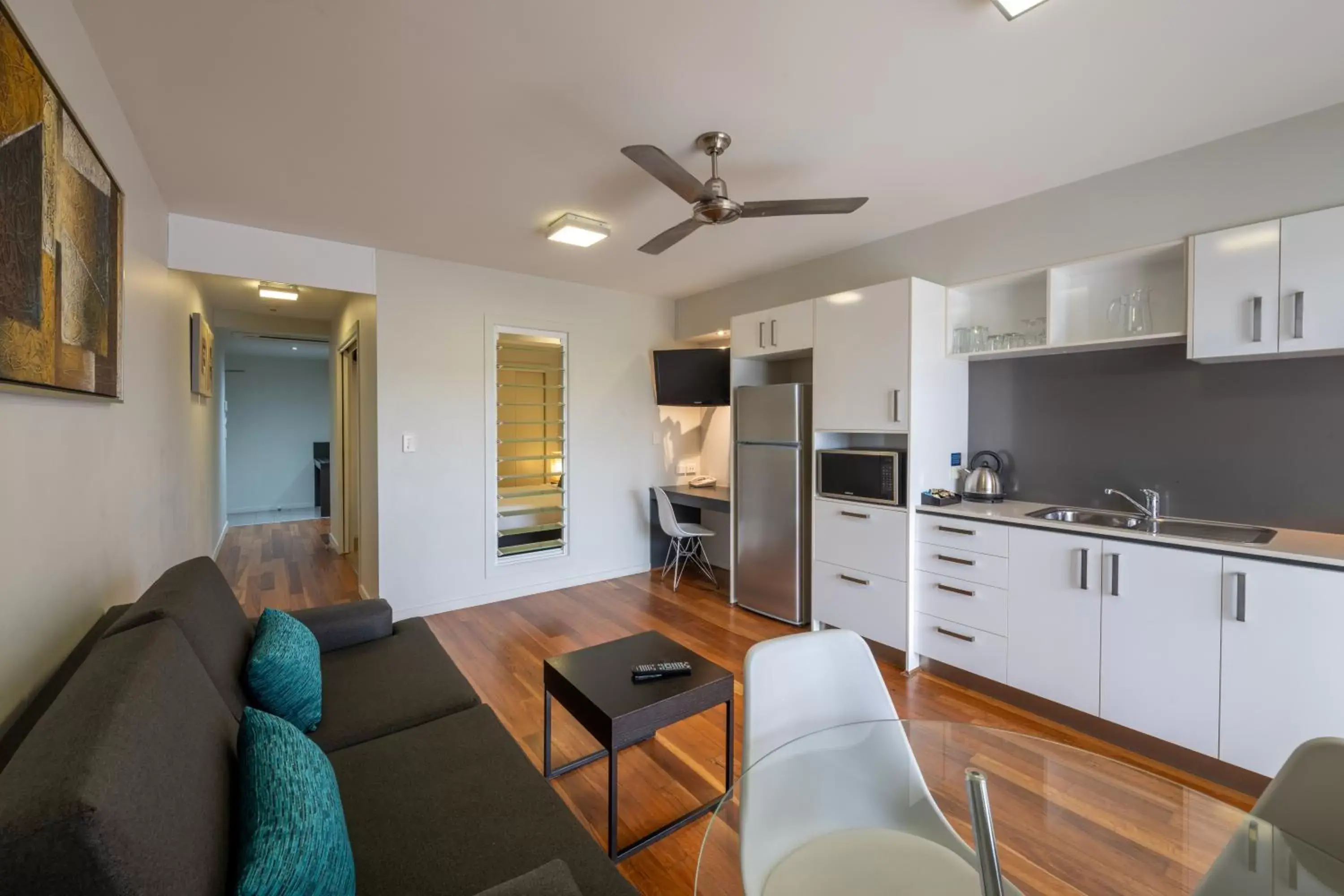 Living room, Kitchen/Kitchenette in Essence Apartments Chermside