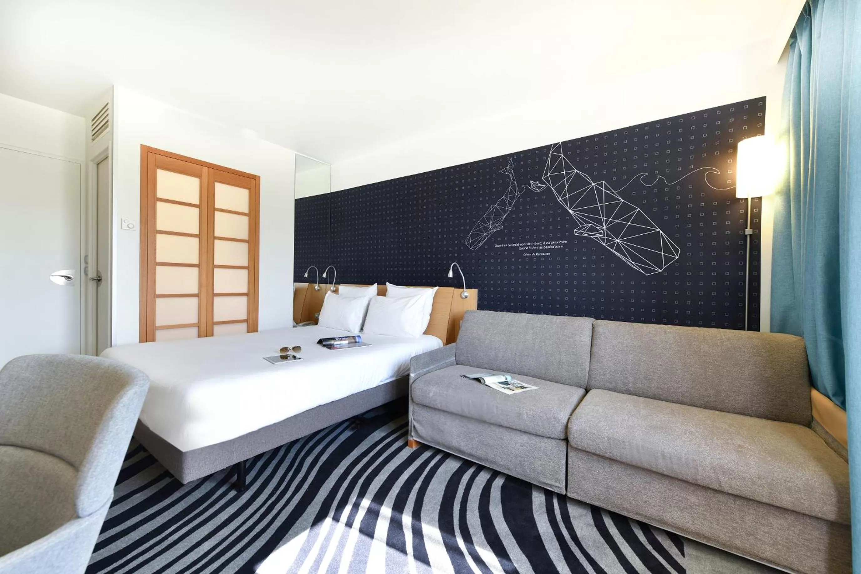 Photo of the whole room, Bed in Novotel La Rochelle Centre