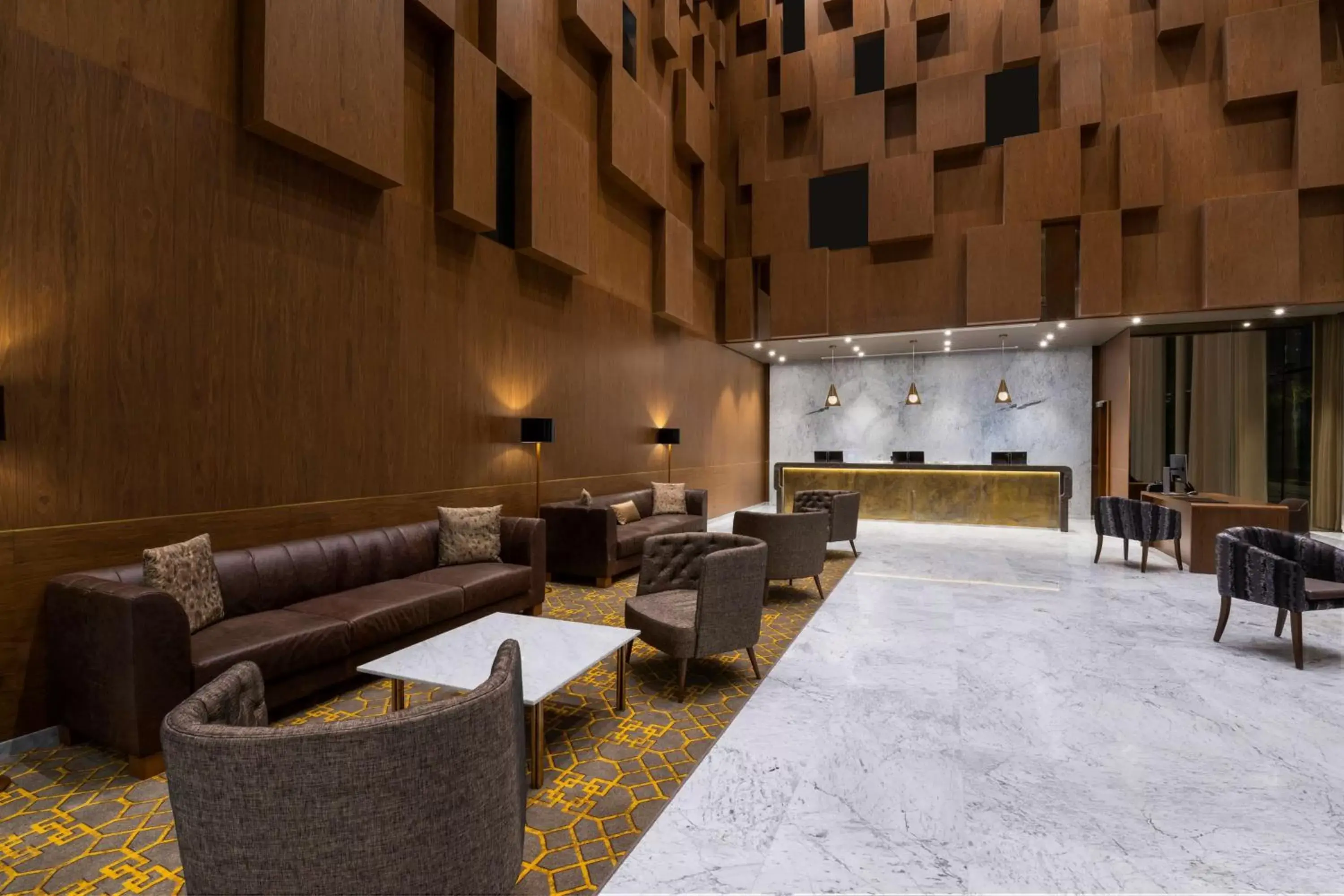 Lobby or reception in Aleph Doha Residences, Curio Collection By Hilton